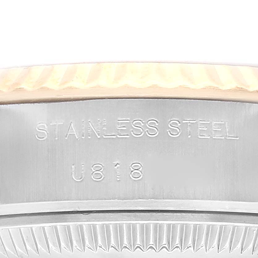 This image shows a close-up of the side of the stainless steel casing of a Rolex Datejust 69173 Women's Steel and Gold (two tone) Champagne Dial 69173 Women's Steel and Gold (two tone) Champagne Dial watch.