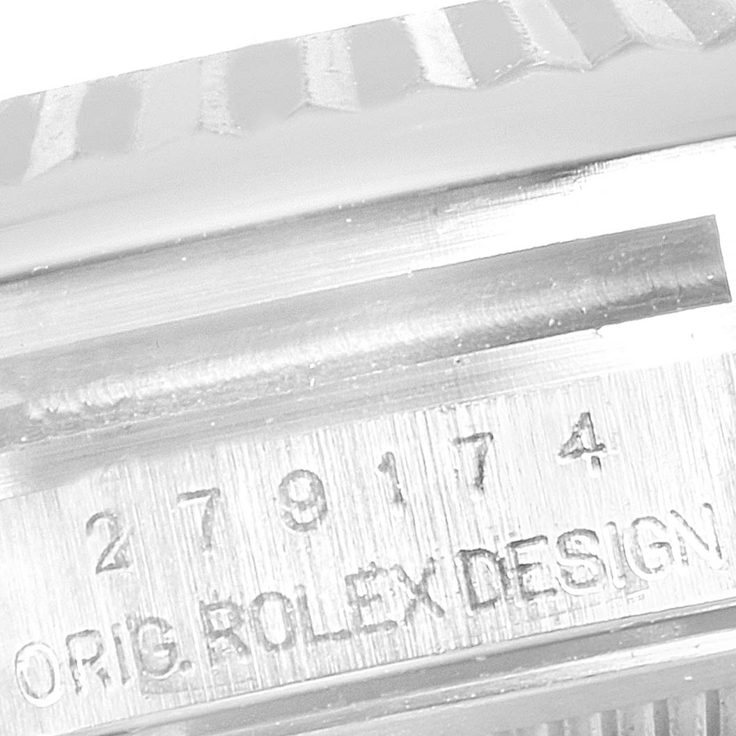 The image shows a close-up of the serial number and part of the bezel of a Rolex Datejust 279174 Women's Stainless Steel Silver Dial 279174 Women's Stainless Steel Silver Dial watch.