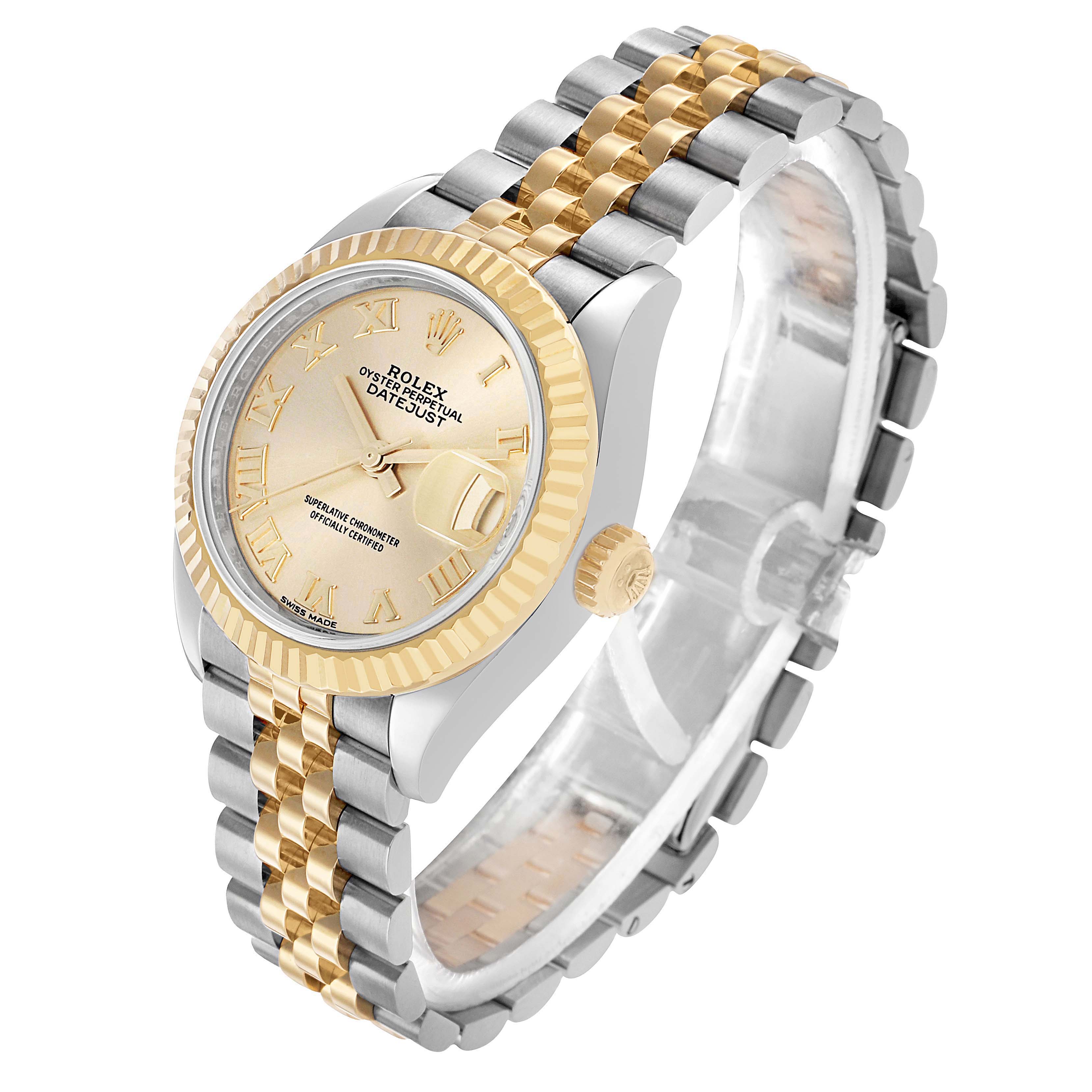 The Rolex Datejust 279173 Women's Steel and Gold (two tone) Champagne Dial watch is shown at a slight angle revealing the face, bezel, crown, and two-tone jubilee bracelet.