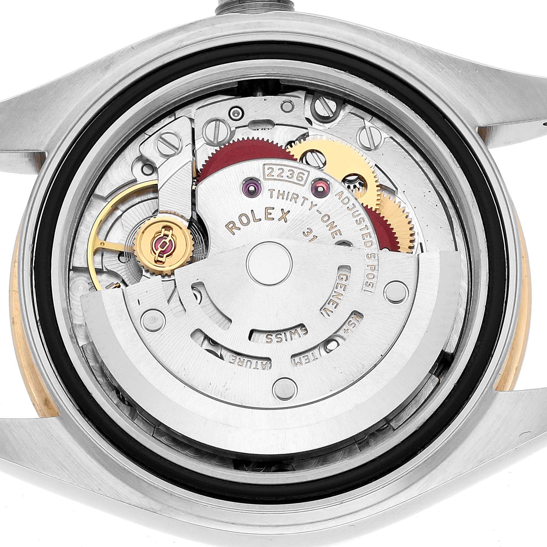 The image shows the back of a Rolex Datejust 279173 Women's Steel and Gold (two tone) Champagne Dial, highlighting the intricate watch movement and rotor.