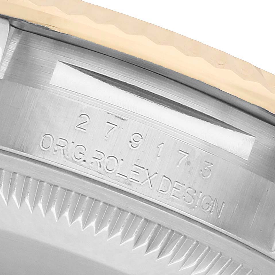 The image shows the side of a Rolex Datejust 279173 Women's Steel and Gold (two tone) Champagne Dial, highlighting the engraved "ORIG. ROLEX DESIGN" and model number on the case.