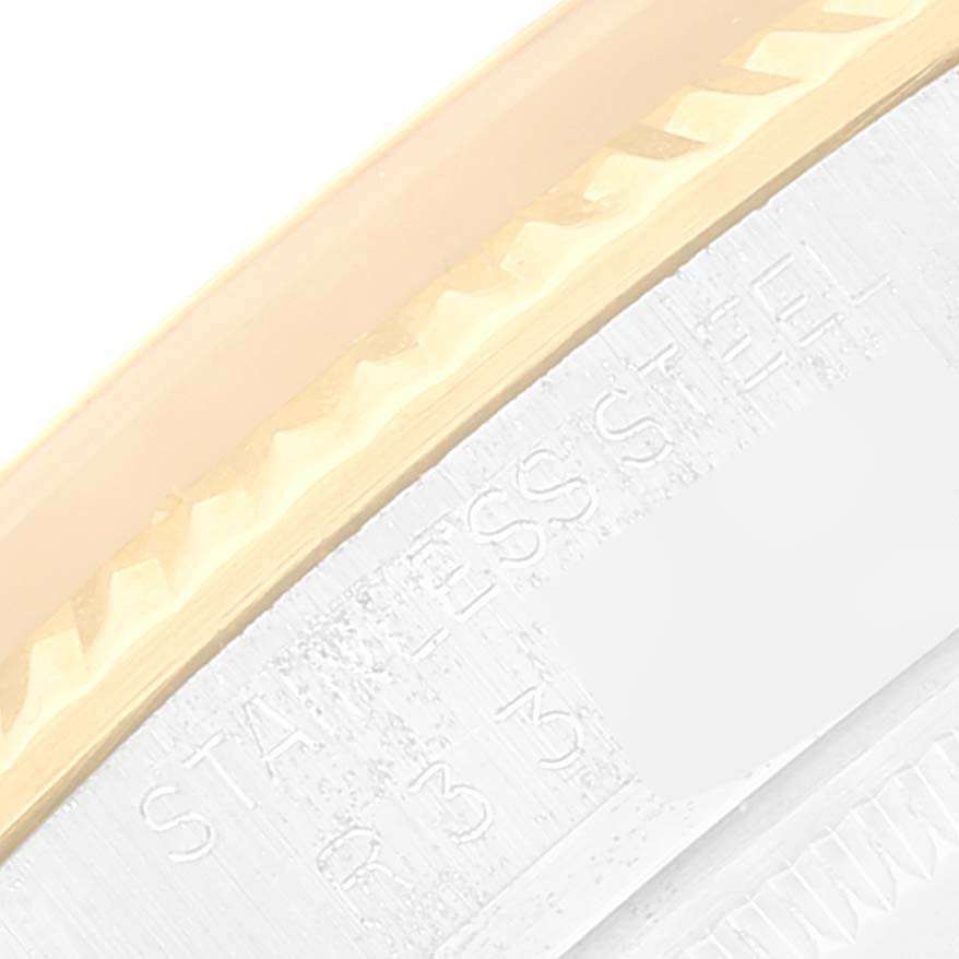 This close-up image shows the side bezel and caseback of a Rolex Vintage Collection 16013 Men
s Steel and Gold (two tone) Champagne Dial 16013 Men
s Steel and Gold (two tone) Champagne Dial model watch.