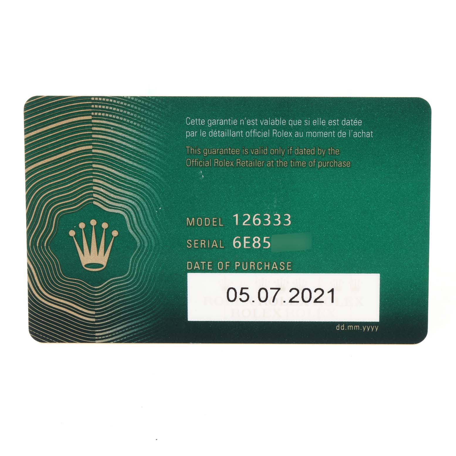 This is a warranty card for a Rolex Datejust 41 126333 Men's Steel and Gold (two tone) Black Dial 126333 Men's Steel and Gold (two tone) Black Dial model, showing the model number, serial number, and date of purchase.