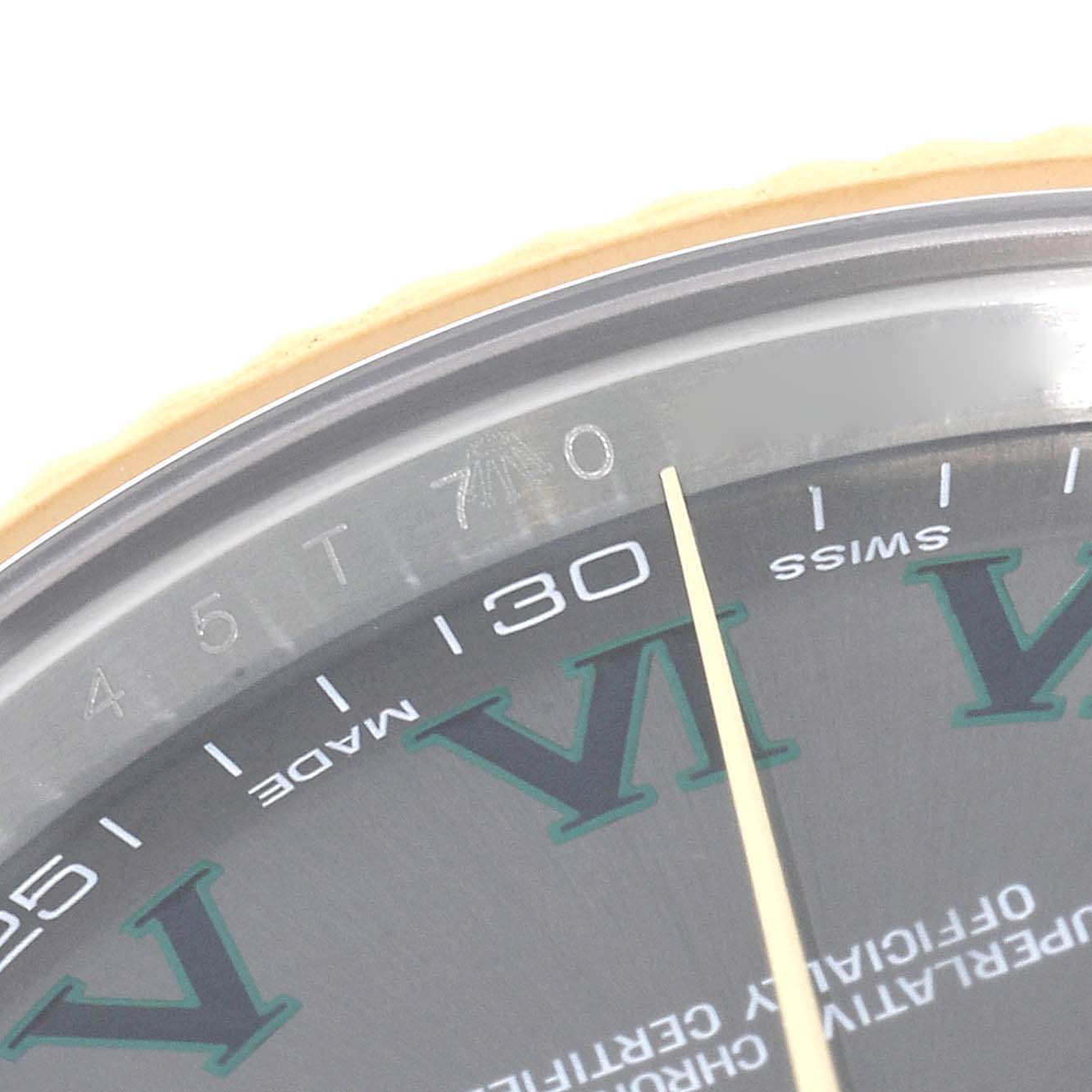 This close-up angle of the Rolex Datejust 41 116333 Men's Steel and Gold (two tone) Grey Dial 116333 Men's Steel and Gold (two tone) Grey Dial model showcases the dial, featuring Roman numerals and part of the minute track.