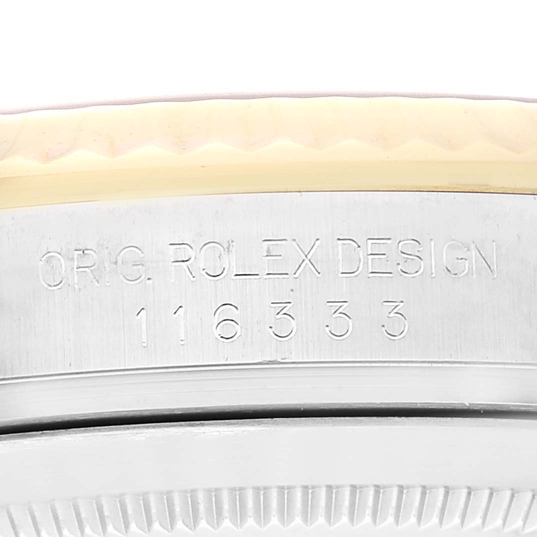 The image shows the engraved side of the bezel and case on a Rolex Datejust 41 116333 Men's Steel and Gold (two tone) Grey Dial 116333 Men's Steel and Gold (two tone) Grey Dial model.