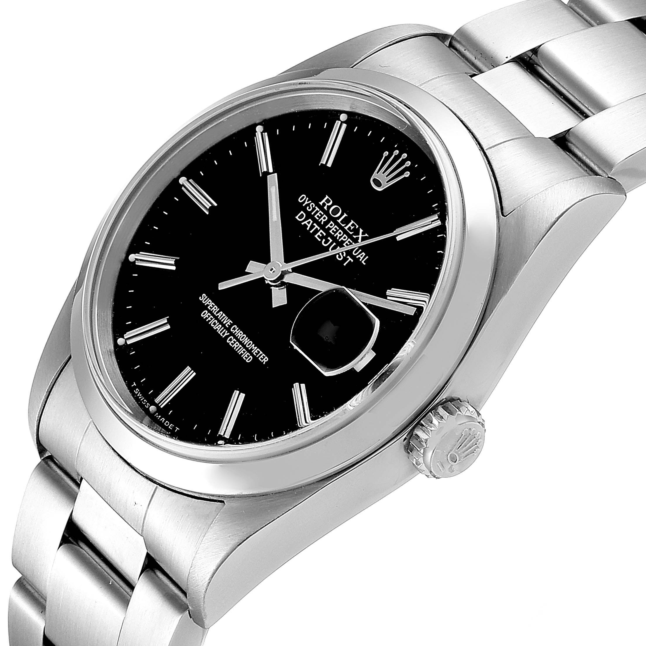 This image shows a close-up angle of the Rolex Datejust 16200 Men's Stainless Steel Black Dial 16200 Men's Stainless Steel Black Dial watch, displaying the face, crown, and part of the stainless steel bracelet.