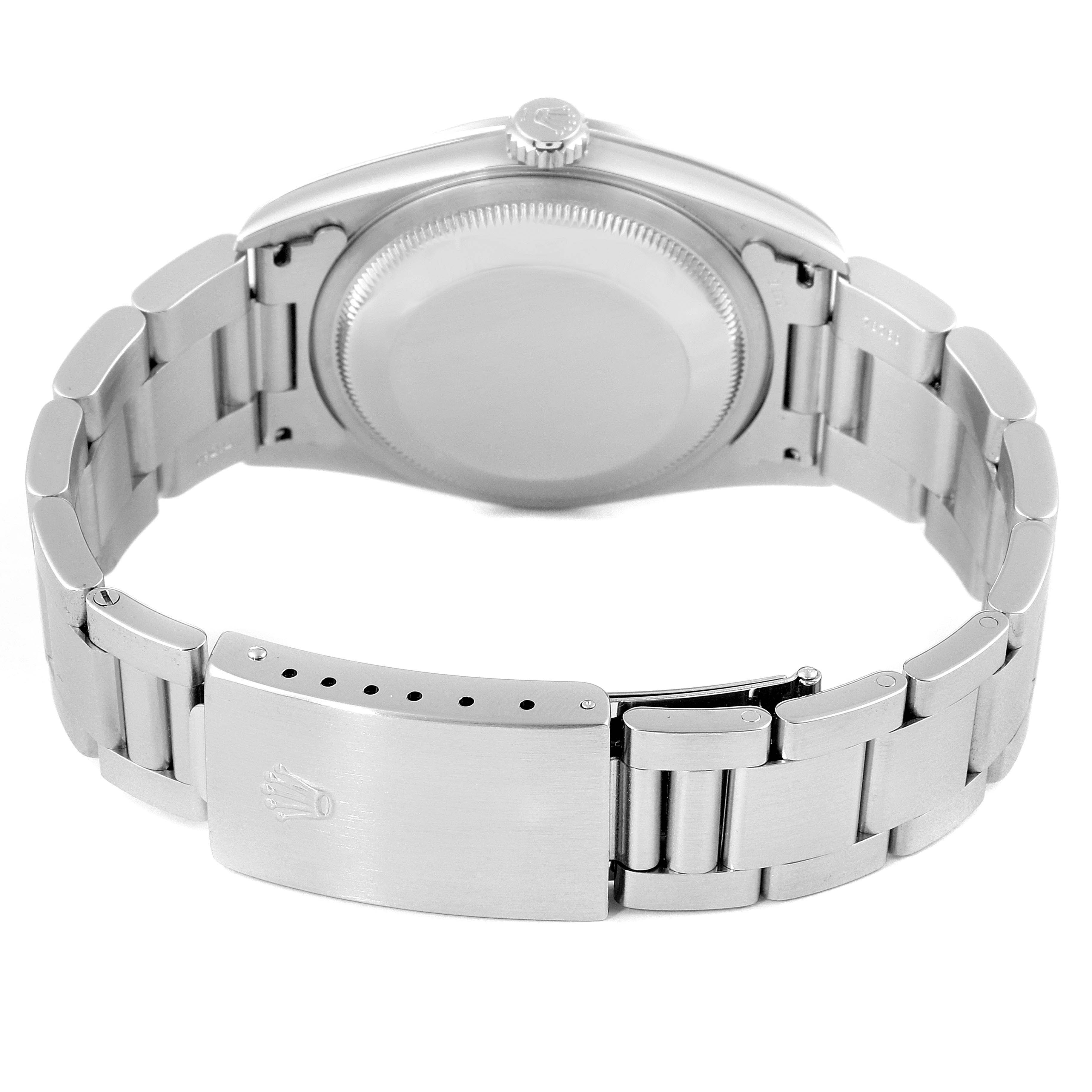 This image shows the back of a Rolex Datejust 16200 Men's Stainless Steel Black Dial 16200 Men's Stainless Steel Black Dial watch, highlighting the case back and the metal bracelet with the clasp.