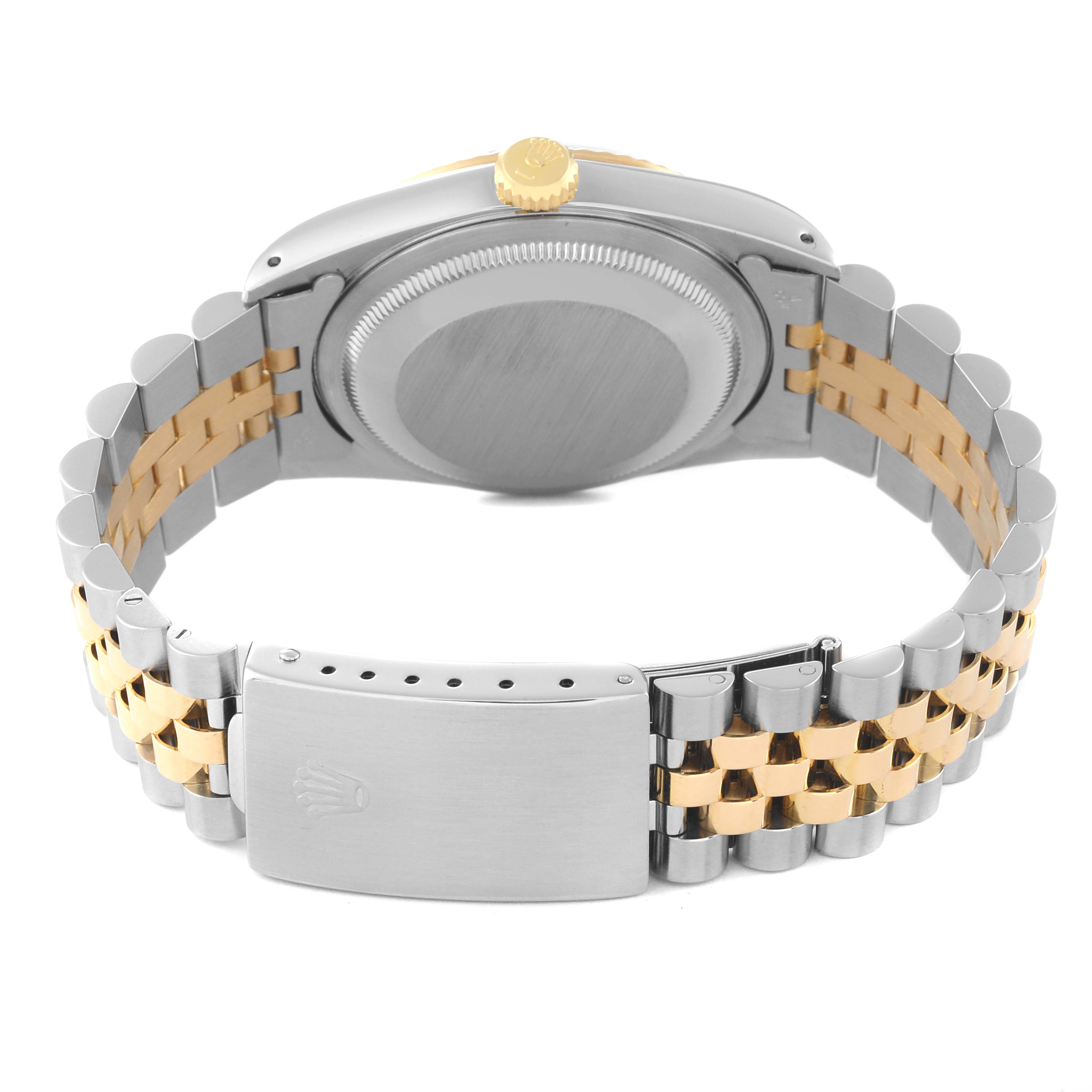 The image shows the back view of a Rolex Datejust 16233 Men's Steel and Gold (two tone) Champagne Dial 16233 Men's Steel and Gold (two tone) Champagne Dial watch, highlighting its caseback, bracelet, and clasp.