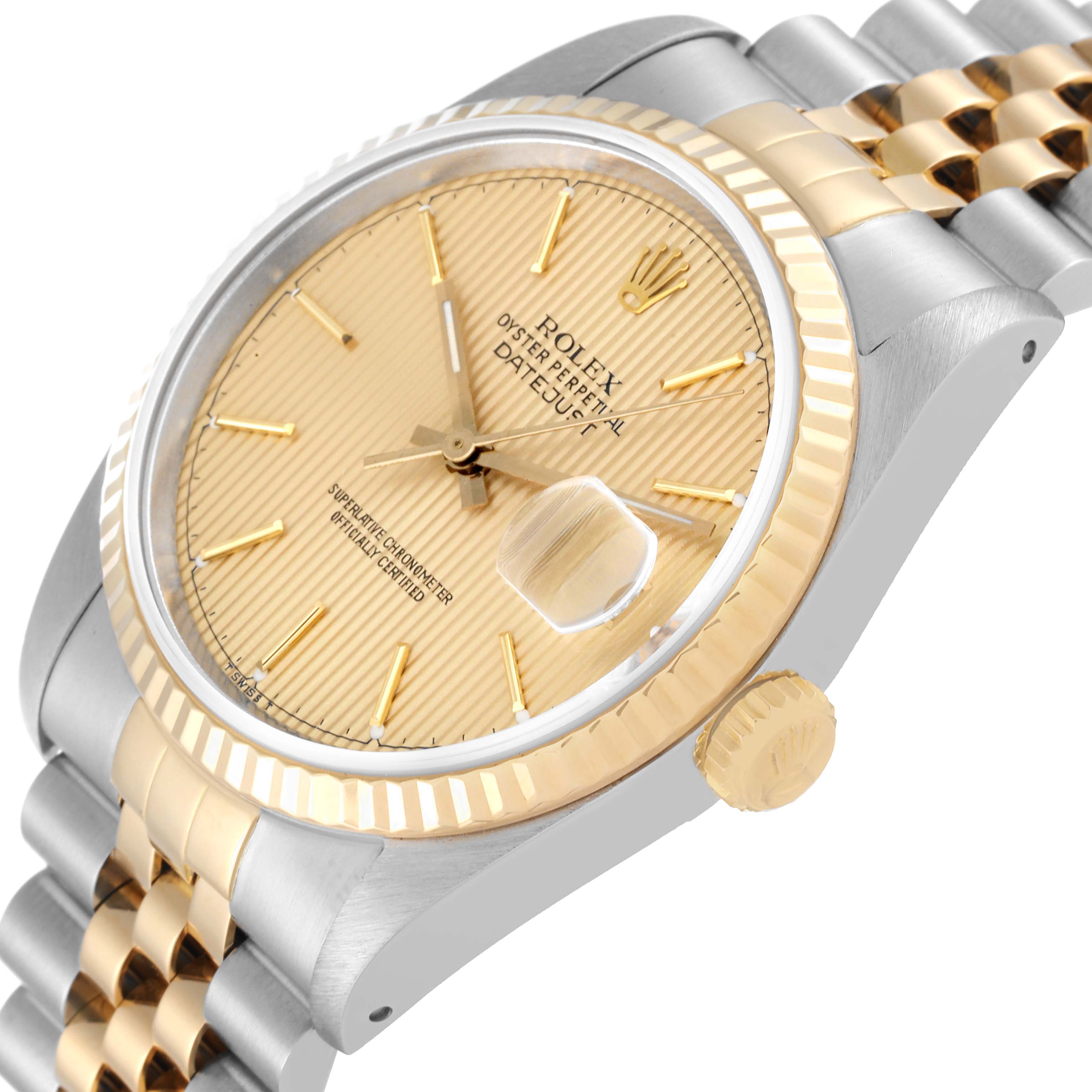The image shows a close-up angled view of the face, bezel, and part of the bracelet of a Rolex Datejust 16233 Men's Steel and Gold (two tone) Champagne Dial 16233 Men's Steel and Gold (two tone) Champagne Dial watch.