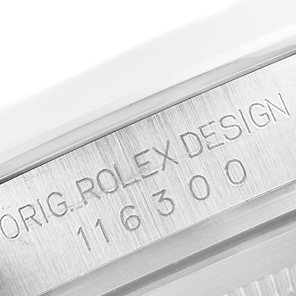 This is a close-up view of the Rolex Datejust 41 116300 Men
s Stainless Steel Black Dial 116300 Men
s Stainless Steel Black Dial, showing the engraved model number and "Orig. Rolex Design" on its case.