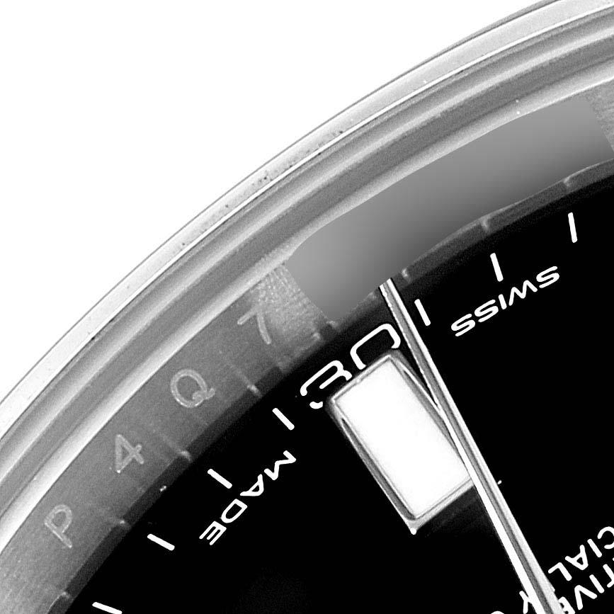The image shows a close-up of the dial and date window of a Rolex Datejust 41 116300 Men
s Stainless Steel Black Dial 116300 Men
s Stainless Steel Black Dial watch at an angle.