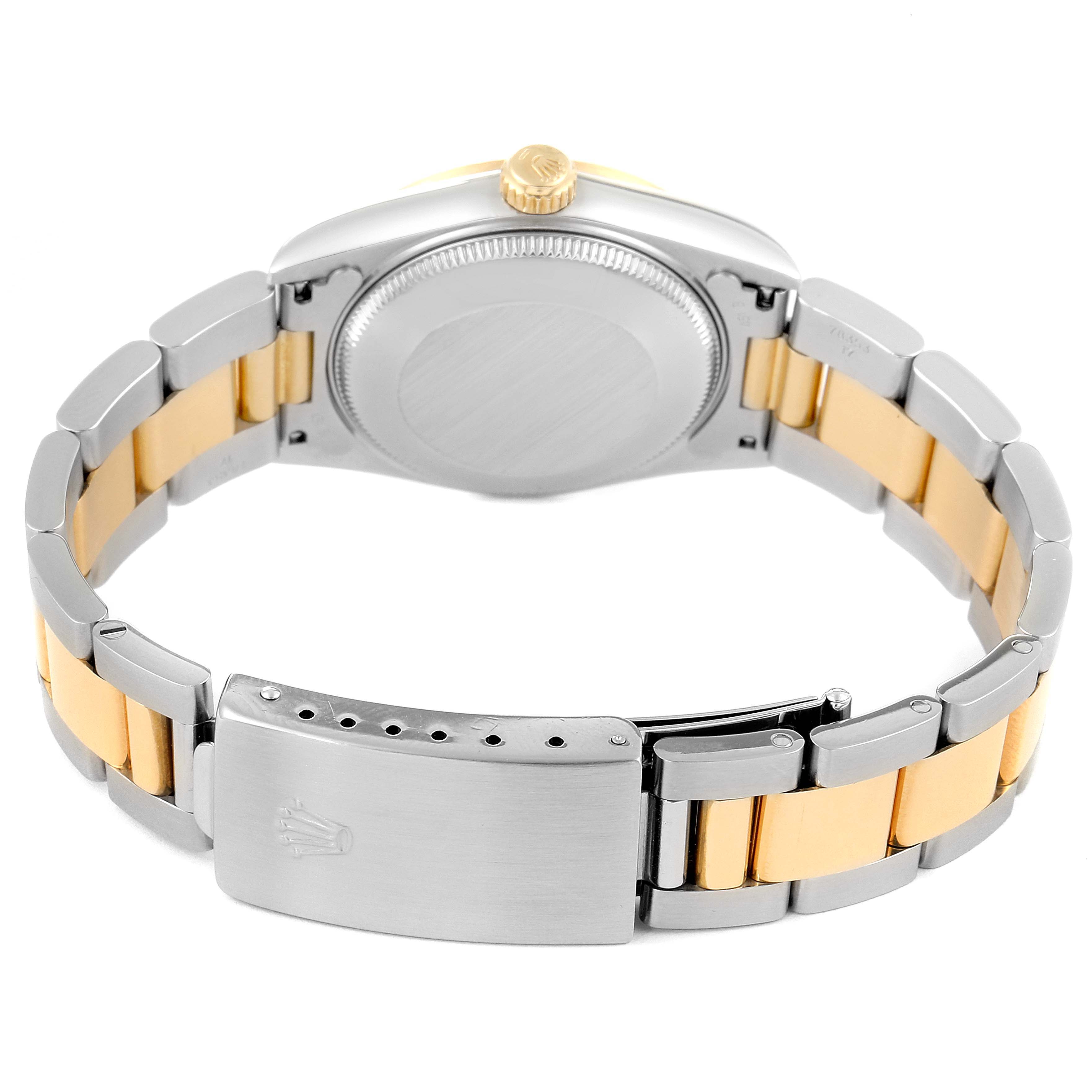 The image shows the back, crown, and bracelet of a Rolex Mid-Size 68273 Women's Steel and Gold (two tone) Champagne Dial 68273 Women's Steel and Gold (two tone) Champagne Dial watch.