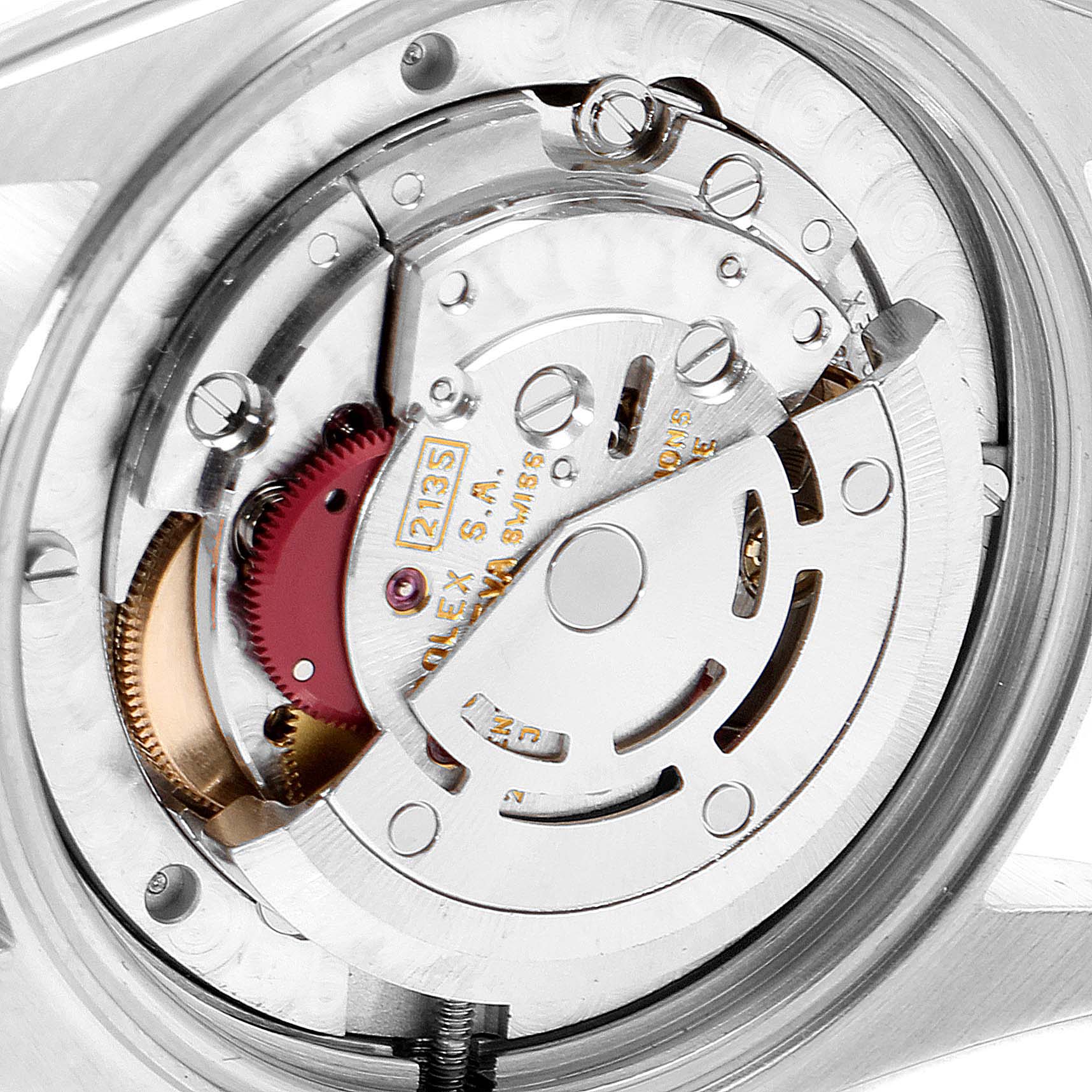 The image shows a close-up of the movement mechanism of a Mid-Size Rolex watch.