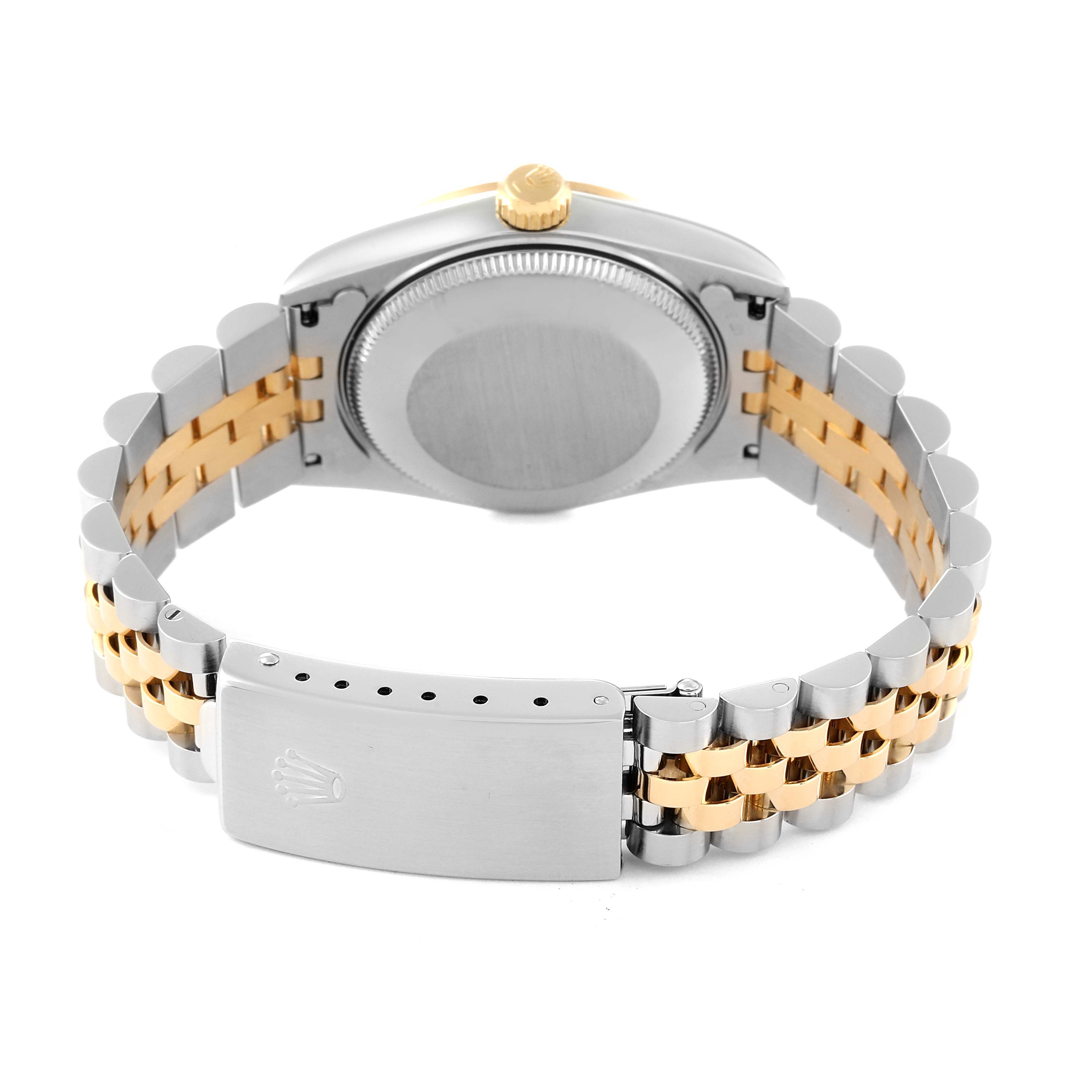 The image shows the back view of a Rolex Mid-Size 68273 Women's Steel and Gold (two tone) Champagne Dial 68273 Women's Steel and Gold (two tone) Champagne Dial model watch, highlighting its case back and two-tone bracelet.