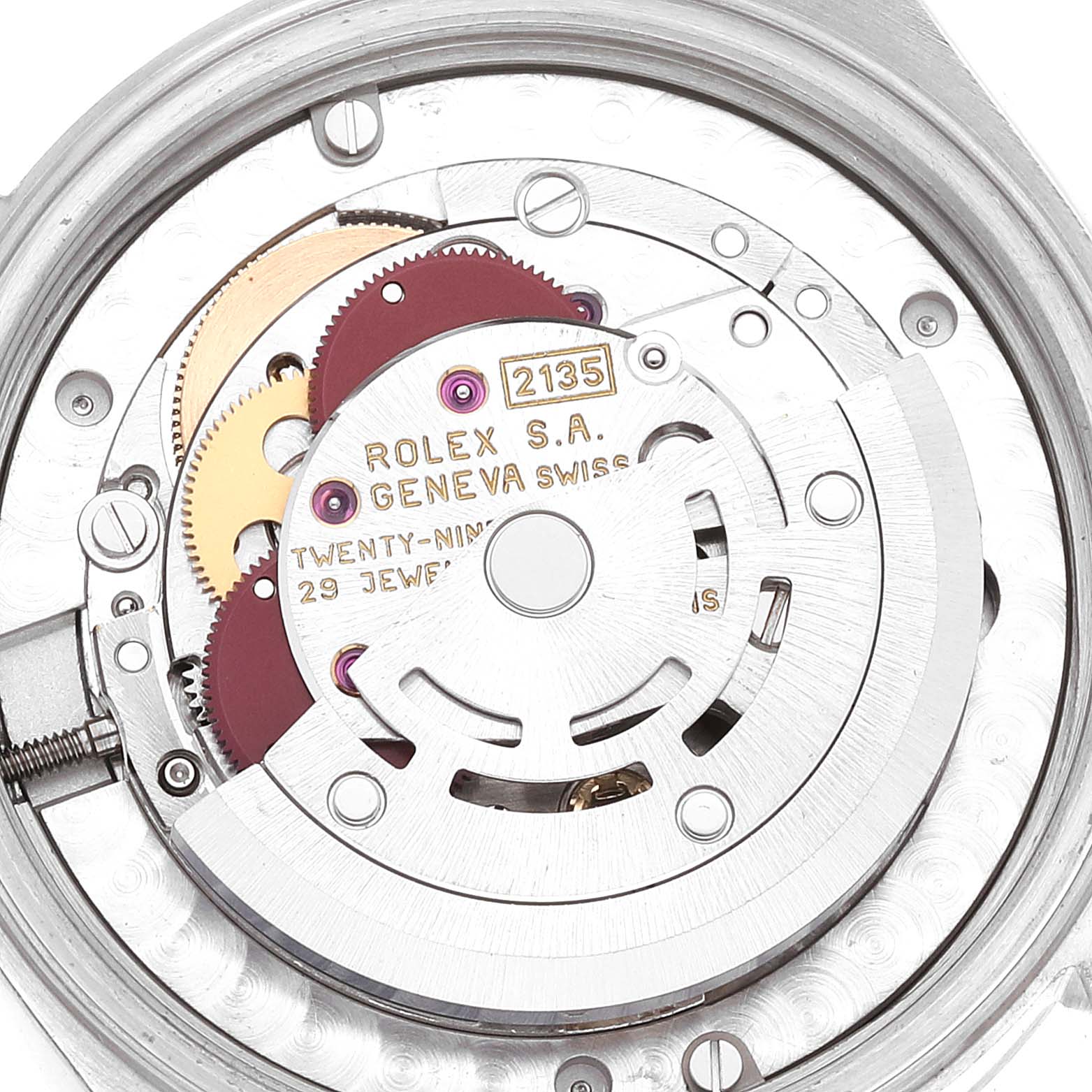 This image shows the inner mechanical movement of a Mid-Size Rolex watch from the back.