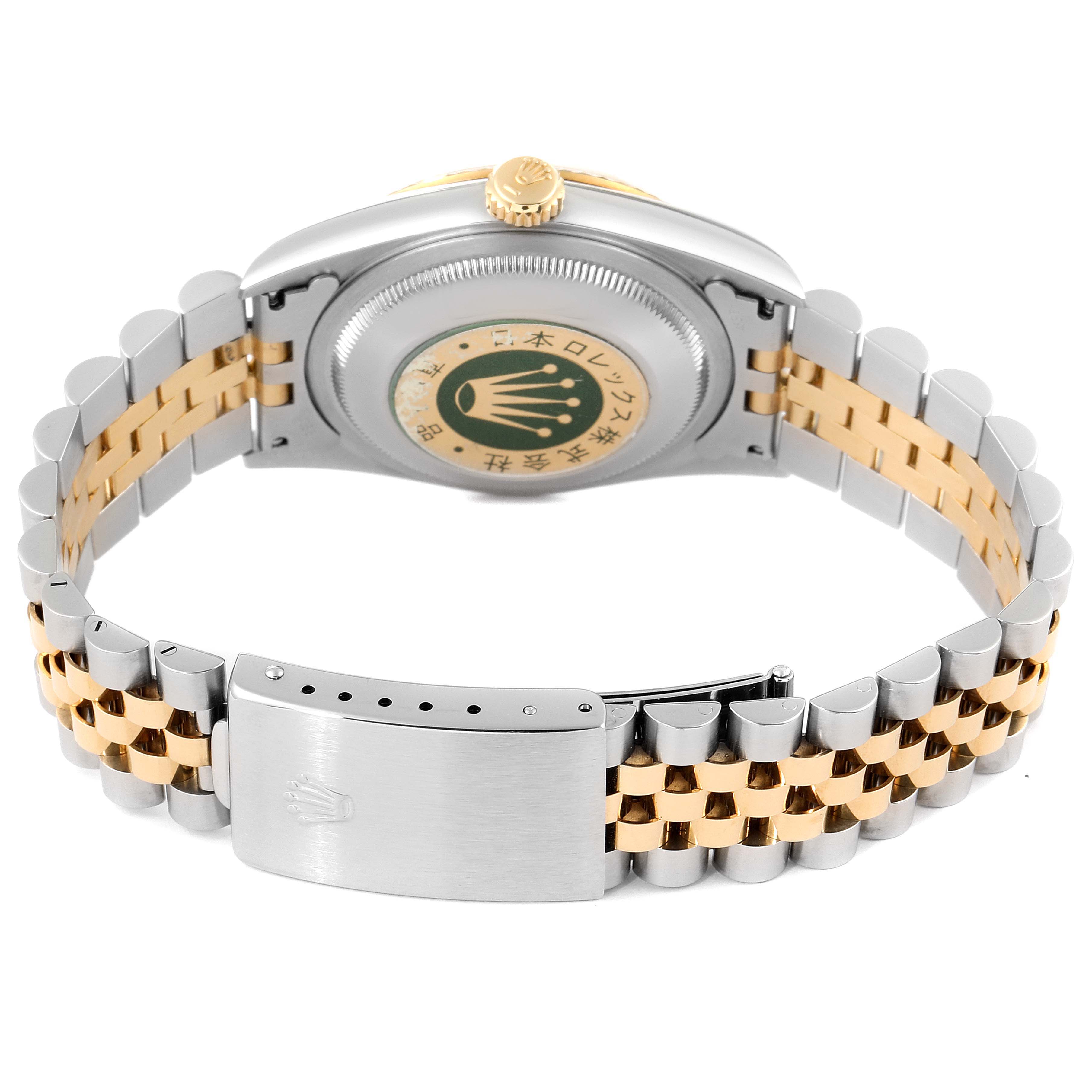 This image shows the case back and bracelet of a Rolex Datejust 16233 Men's Steel and Gold (two tone) Champagne Dial 16233 Men's Steel and Gold (two tone) Champagne Dial watch from a rear angle.
