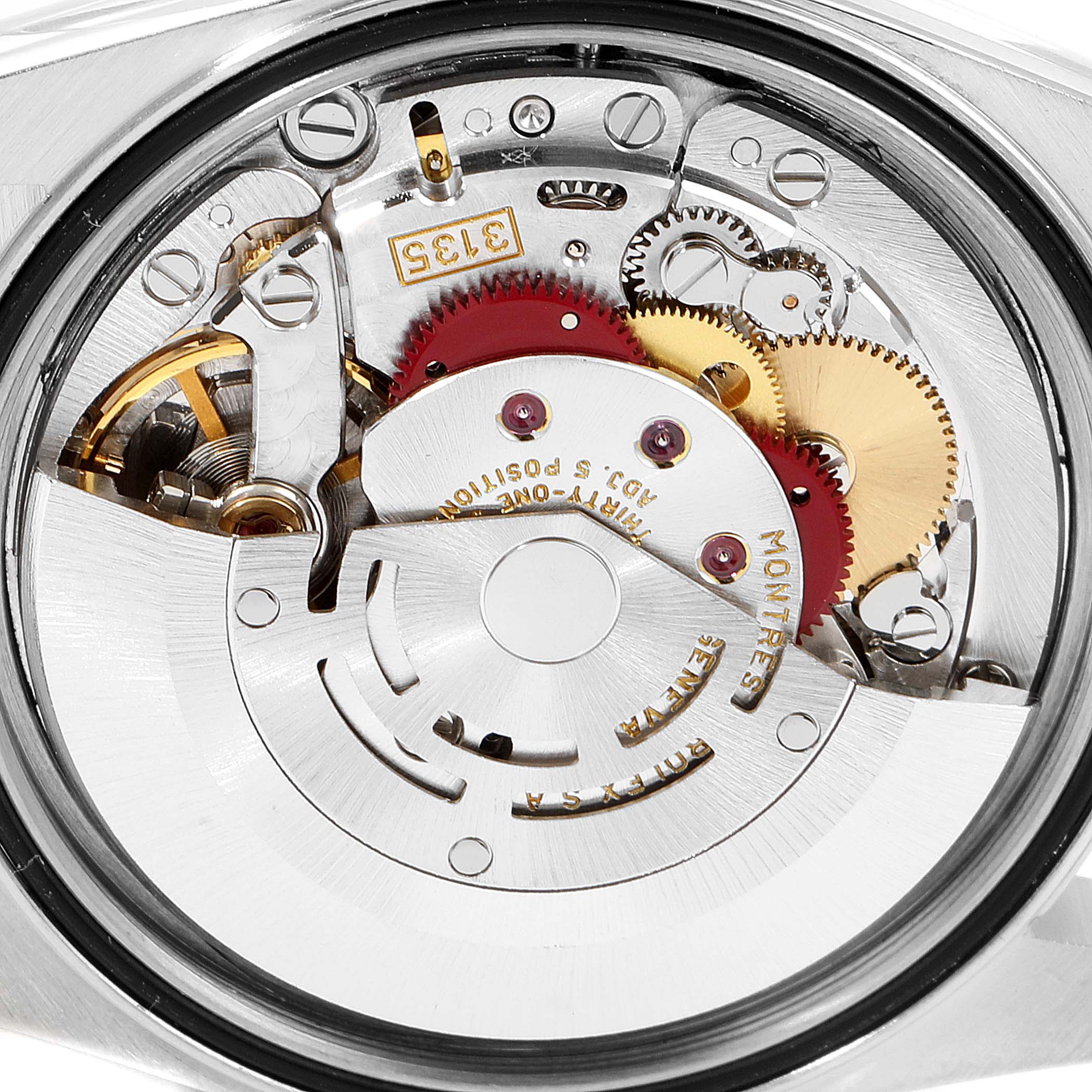 This is a close-up view of the inner mechanical components of a Rolex Datejust 16233 Men's Steel and Gold (two tone) Champagne Dial 16233 Men's Steel and Gold (two tone) Champagne Dial watch.