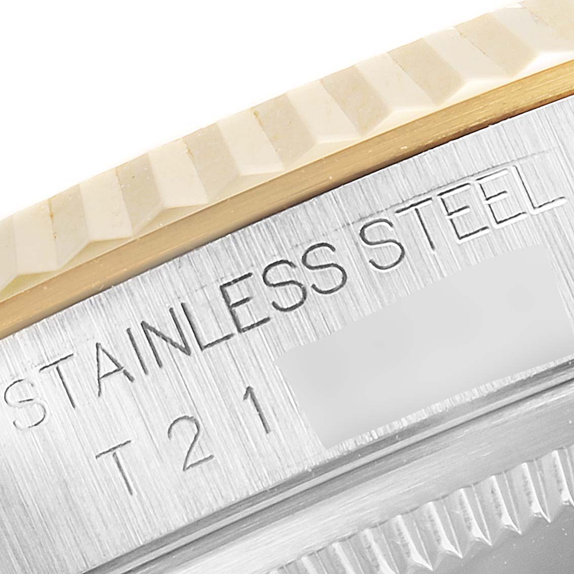 The image shows a close-up of the bezel and case side of a Rolex Datejust 16233 Men's Steel and Gold (two tone) Champagne Dial 16233 Men's Steel and Gold (two tone) Champagne Dial watch, highlighting the "STAINLESS STEEL" engraving.