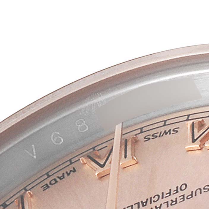 The image shows a close-up of the dial and part of the bezel of a Rolex Datejust 179171 Women's Rose Gold Pink Dial 179171 Women's Rose Gold Pink Dial watch.