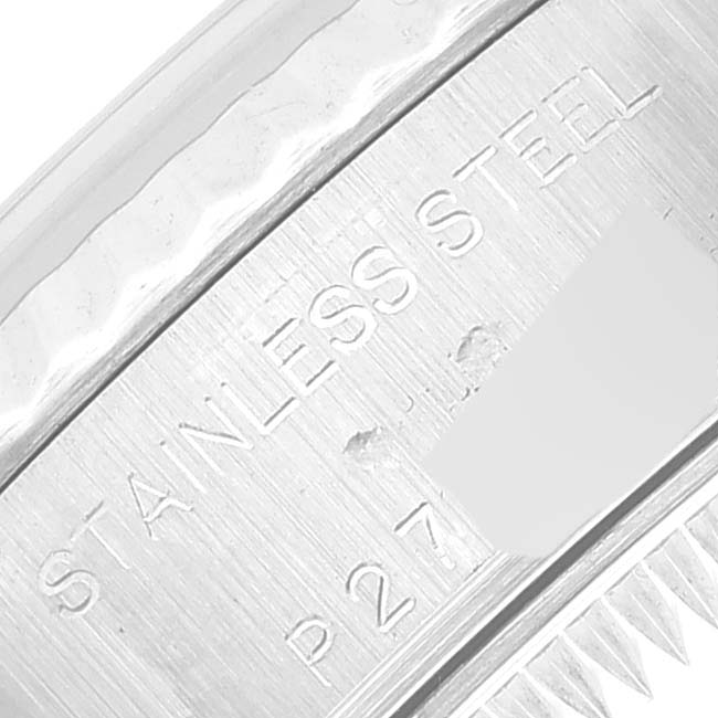 This close-up image shows the stainless steel casing with engravings of a Rolex Datejust 79174 Women's Stainless Steel Mother of Pearl Dial 79174 Women's Stainless Steel Mother of Pearl Dial watch.