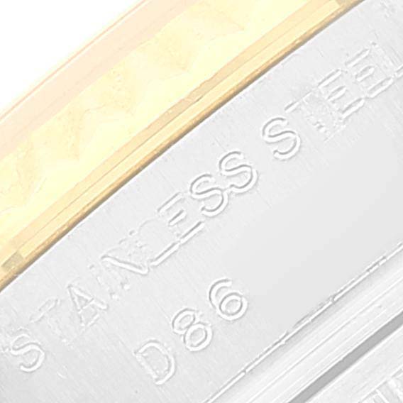 The image shows a close-up of the stainless steel section of the bezel of a Rolex Datejust 179173 Women's Steel and Gold (two tone) Champagne Dial 179173 Women's Steel and Gold (two tone) Champagne Dial watch.