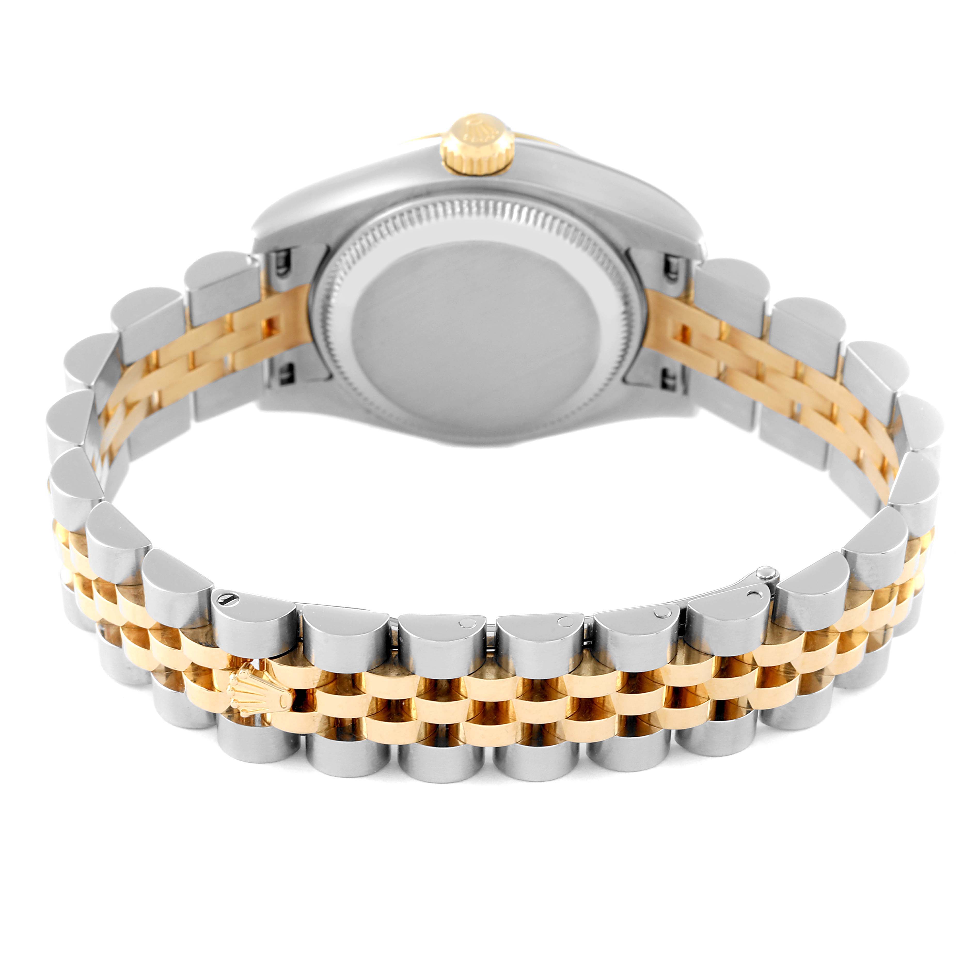 The image shows the backside of a Rolex Datejust 179173 Women's Steel and Gold (two tone) Champagne Dial 179173 Women's Steel and Gold (two tone) Champagne Dial watch, displaying the case and two-tone metal bracelet.