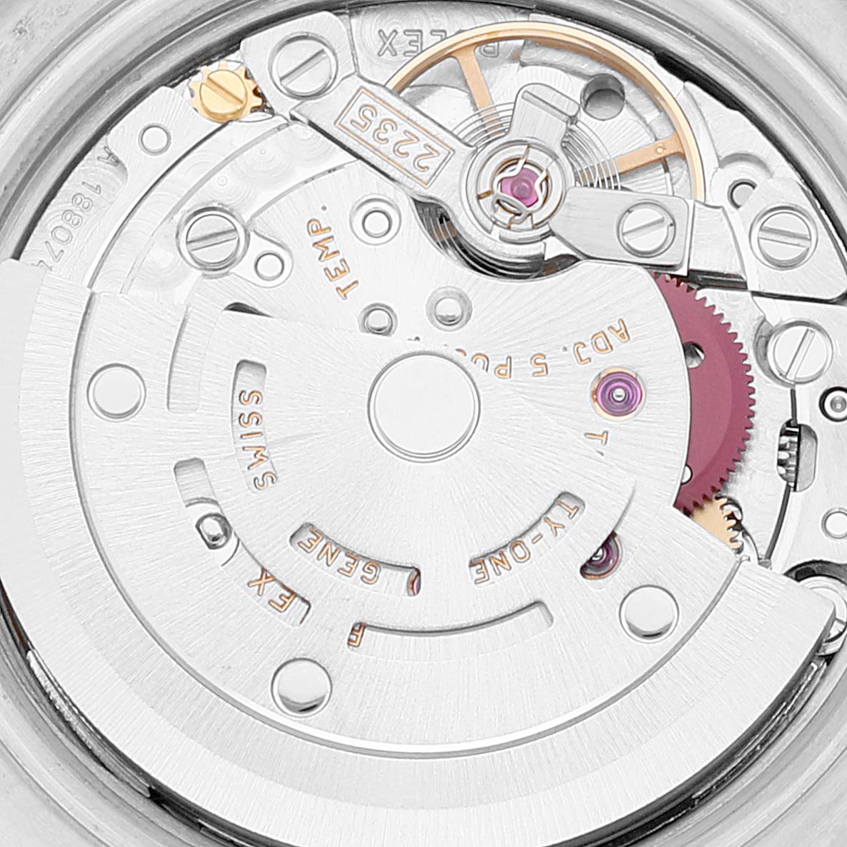 This is a close-up shot of the movement mechanism inside a Rolex Datejust 179173 Women's Steel and Gold (two tone) Champagne Dial 179173 Women's Steel and Gold (two tone) Champagne Dial watch.