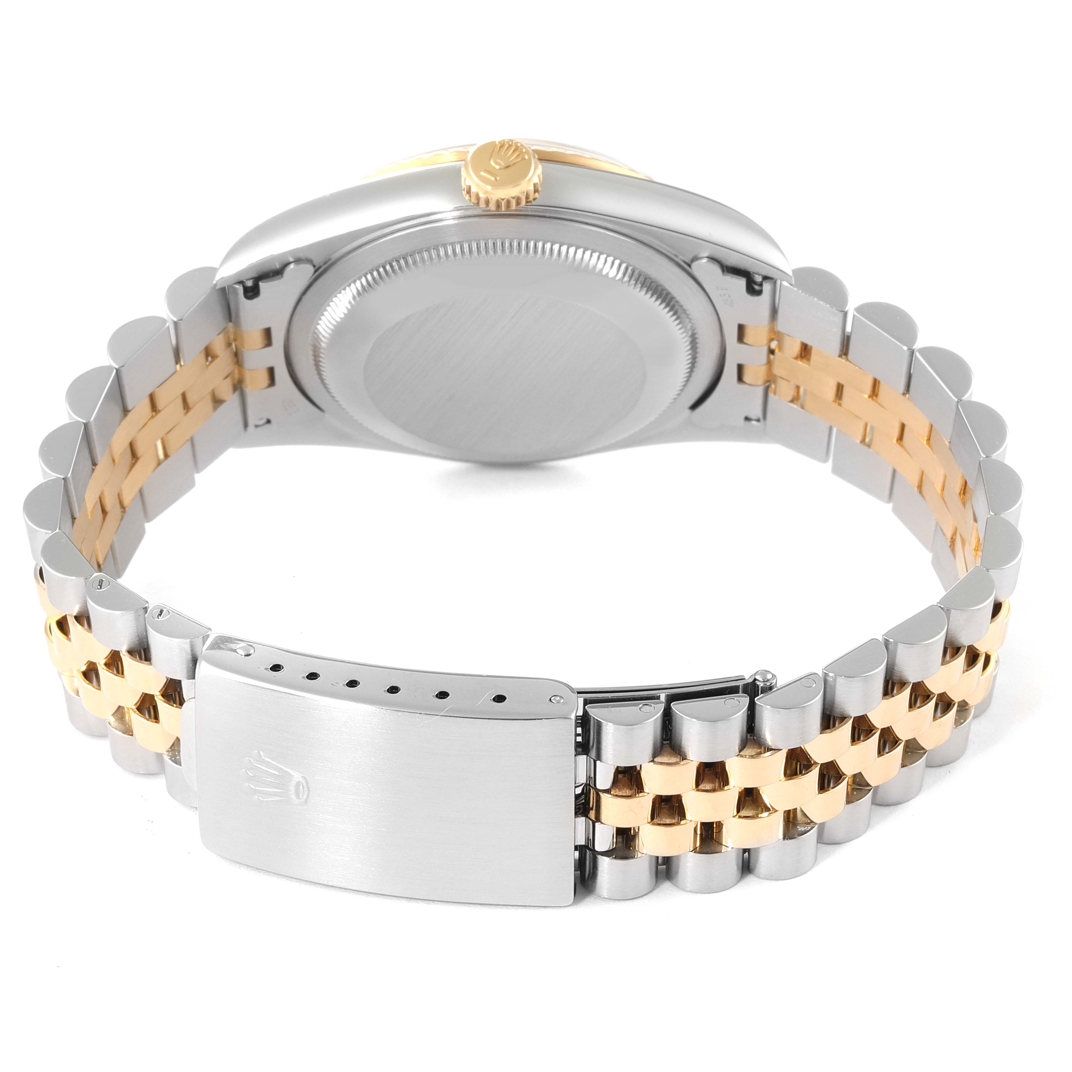 This image shows the back view of a Rolex Datejust 16233 Men's Steel and Gold (two tone) Champagne Dial 16233 Men's Steel and Gold (two tone) Champagne Dial watch, highlighting the case back, crown, and two-tone bracelet with a clasp.