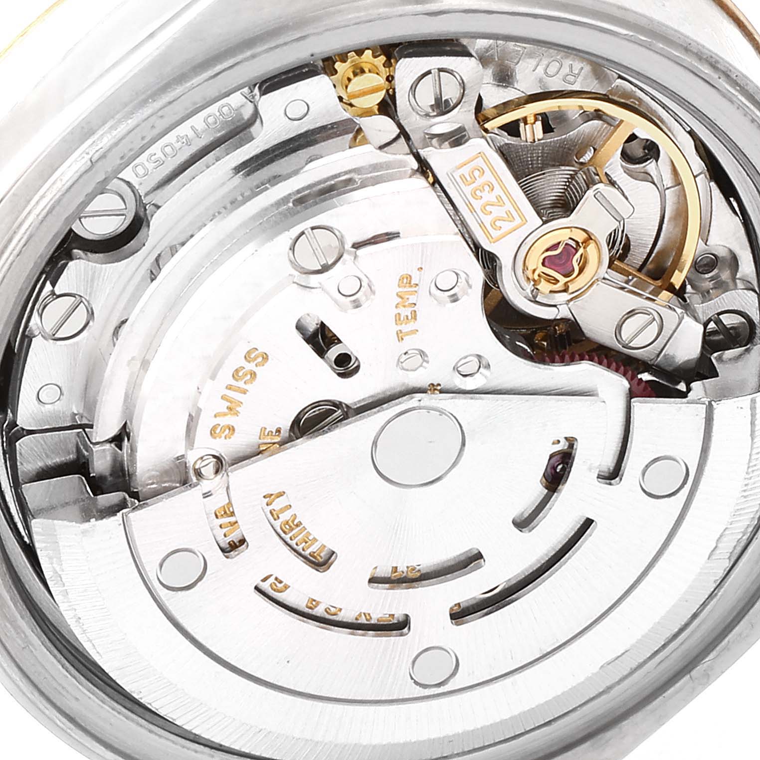 This image shows the inner mechanical components of a Rolex Datejust 79173 Women's Steel and Gold (two tone) Champagne Dial 79173 Women's Steel and Gold (two tone) Champagne Dial watch from a close-up, top-down perspective.