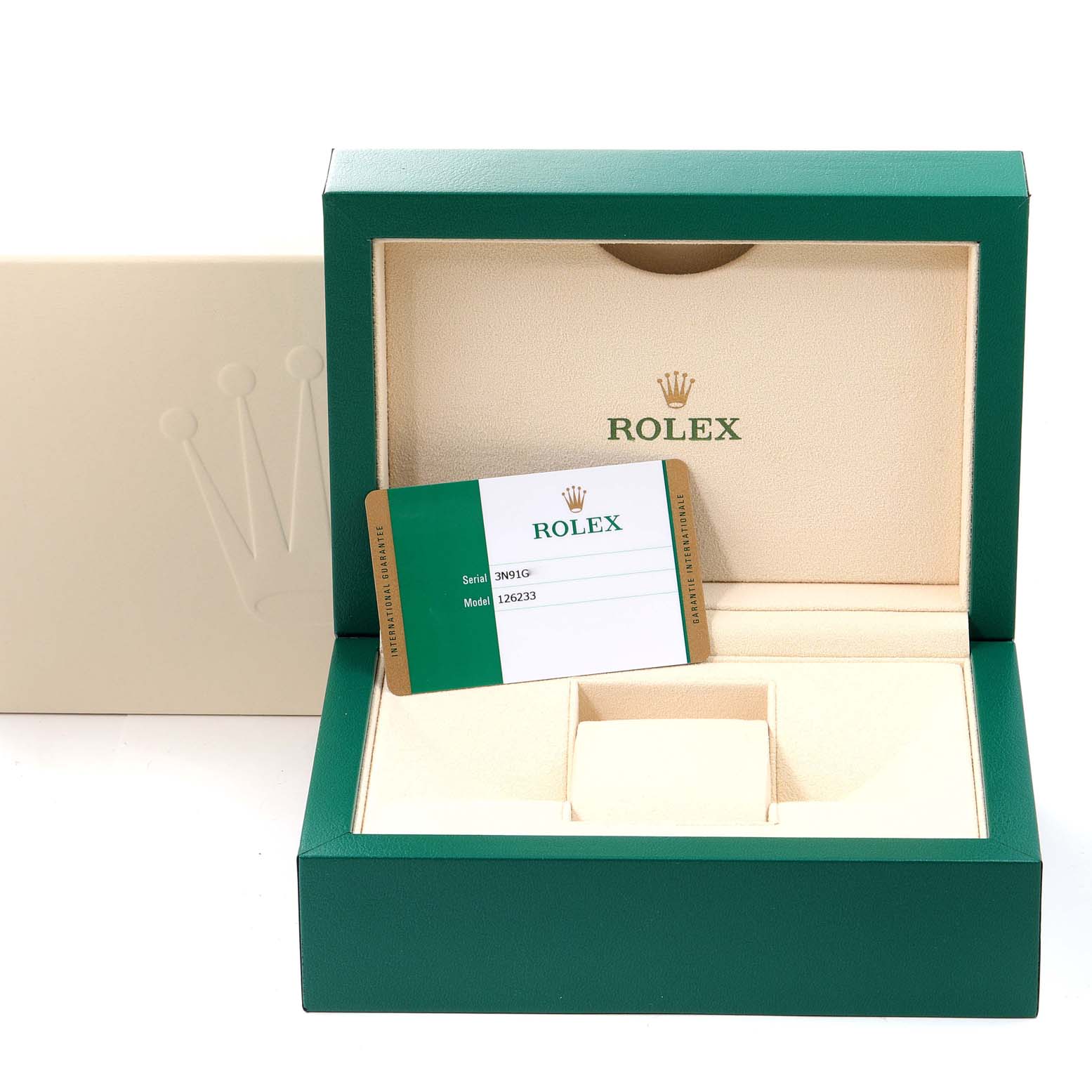 The image shows the packaging of a Rolex Datejust 126233 Men's Steel and Gold (two tone) Silver Dial 126233 Men's Steel and Gold (two tone) Silver Dial watch, including a green watch box, warranty card, and beige cushion.