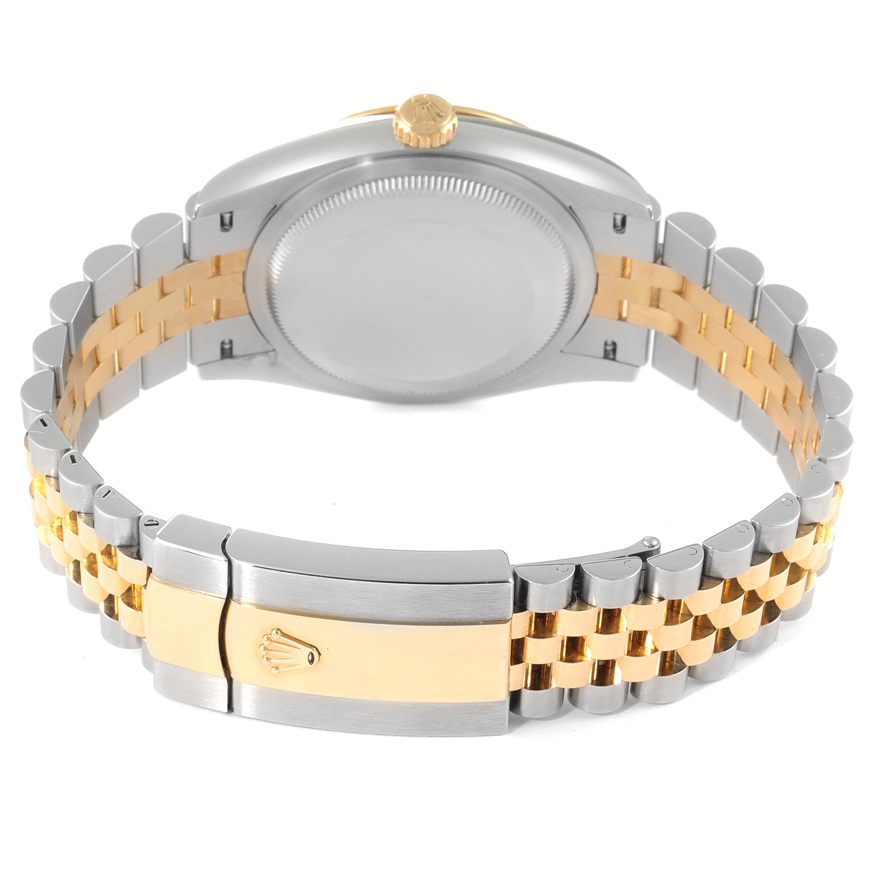 This image shows the back side of a Rolex Datejust 126233 Men's Steel and Gold (two tone) Silver Dial 126233 Men's Steel and Gold (two tone) Silver Dial watch, highlighting the clasp and bracelet.
