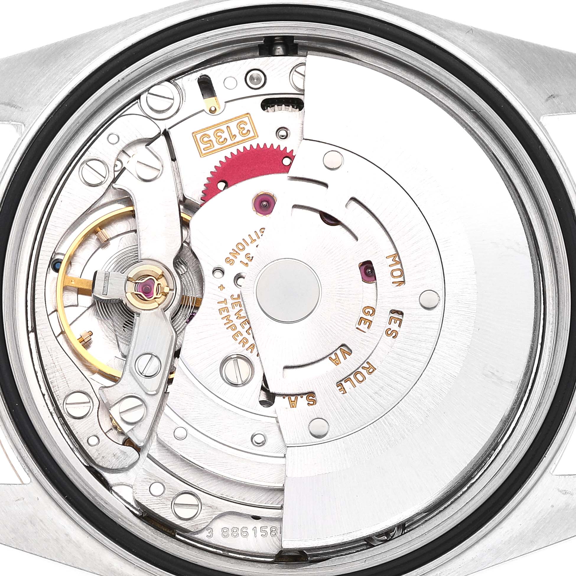 The image shows the internal movement mechanism of a Rolex Datejust 16233 Men's Steel and Gold (two tone) Mother of Pearl Dial 16233 Men's Steel and Gold (two tone) Mother of Pearl Dial watch.