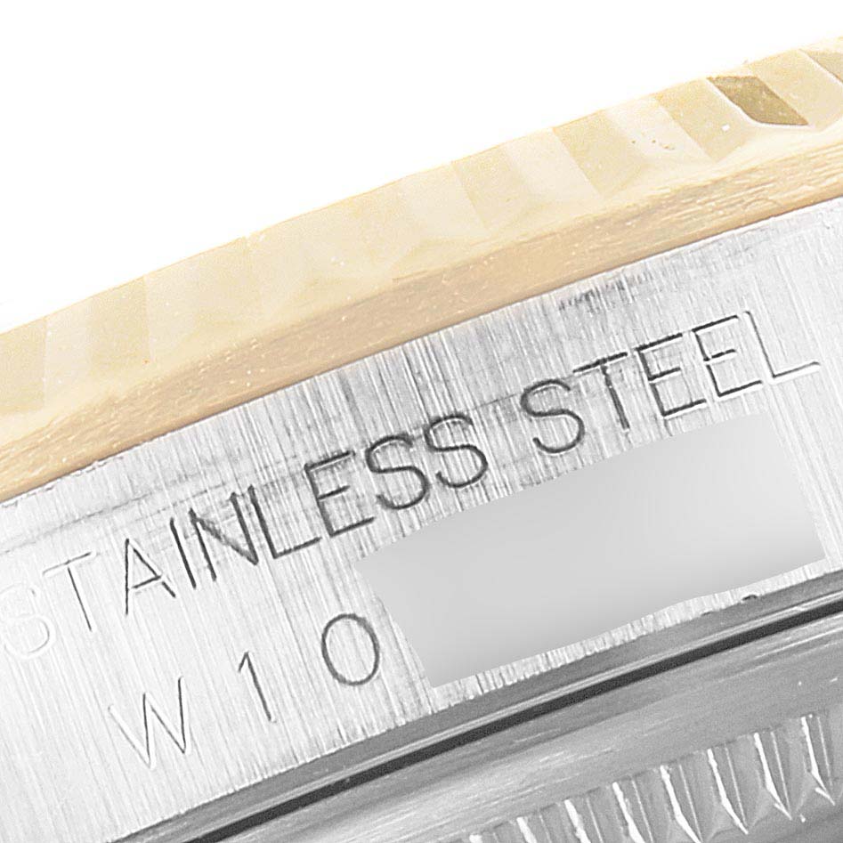 This image shows a close-up angle of the bezel and case of a Rolex Datejust 16233 Men's Steel and Gold (two tone) Silver Dial 16233 Men's Steel and Gold (two tone) Silver Dial watch, highlighting its stainless steel construction.