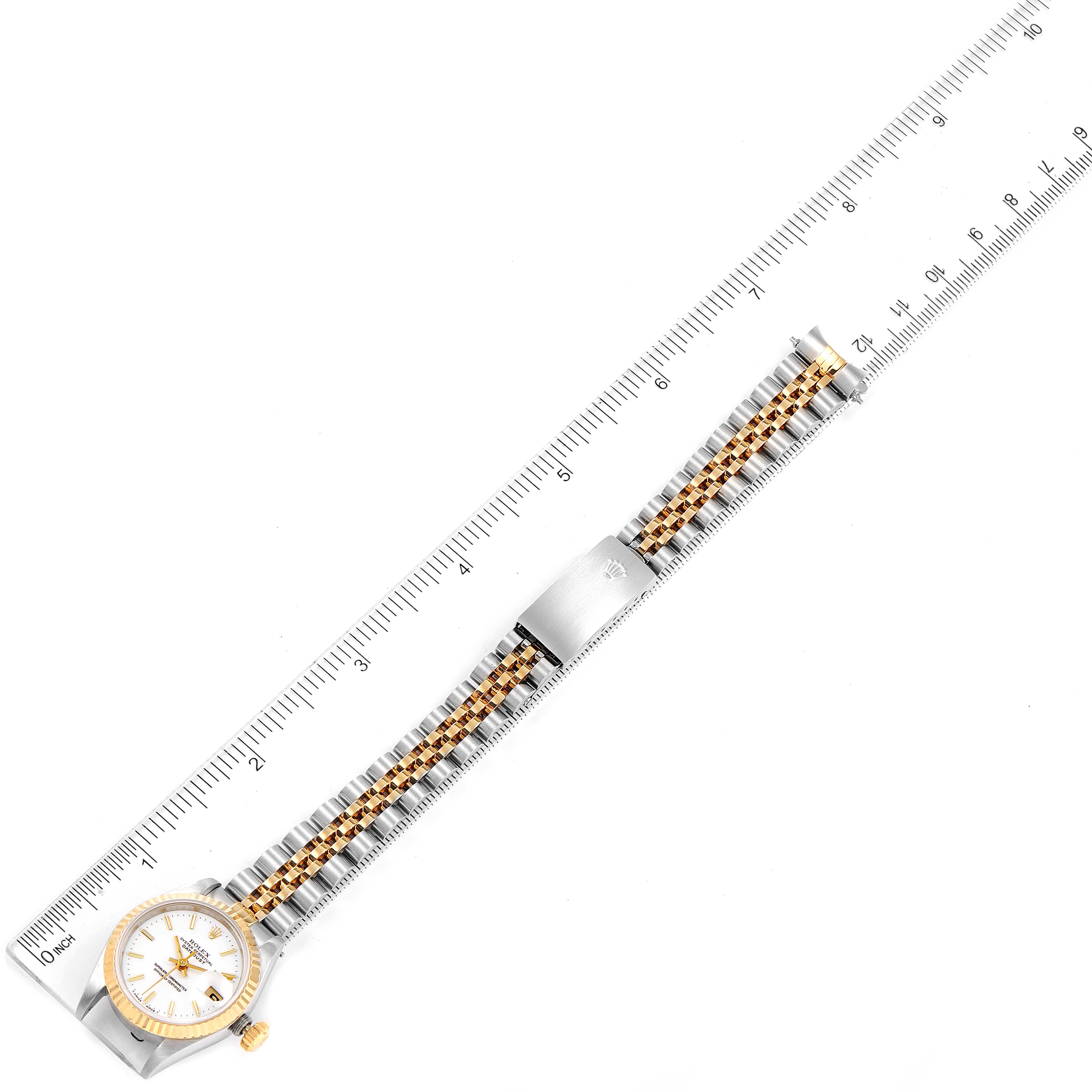 The image shows a Rolex Datejust 69173 Women's Steel and Gold (two tone) White Dial 69173 Women's Steel and Gold (two tone) White Dial watch laid flat, with its full bracelet and part of the dial visible, alongside a ruler for measurement.