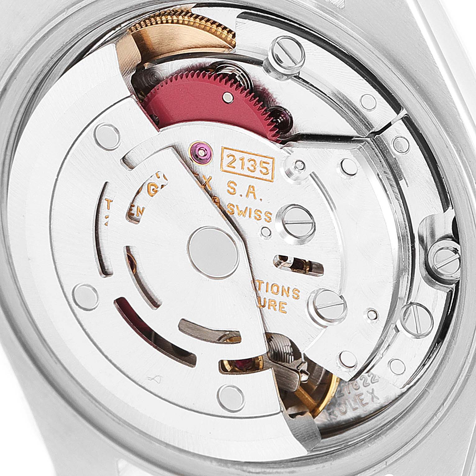 The image shows a close-up of the movement mechanism of a Rolex Datejust 69173 Women's Steel and Gold (two tone) White Dial 69173 Women's Steel and Gold (two tone) White Dial watch.