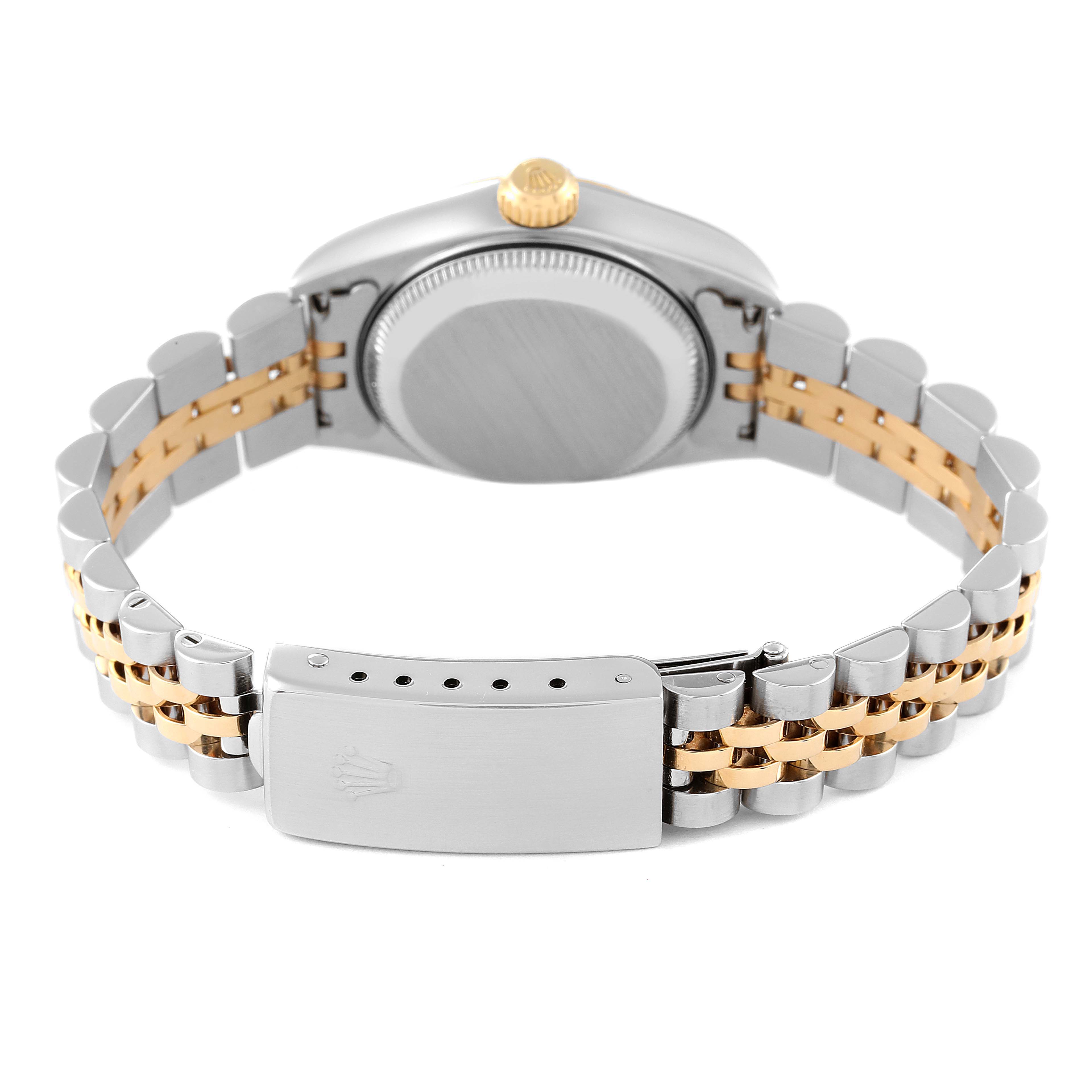 This image shows the back view of a Rolex Datejust 79173 Women's Steel and Gold (two tone) White Dial 79173 Women's Steel and Gold (two tone) White Dial model watch, highlighting its case back, crown, and two-tone bracelet.