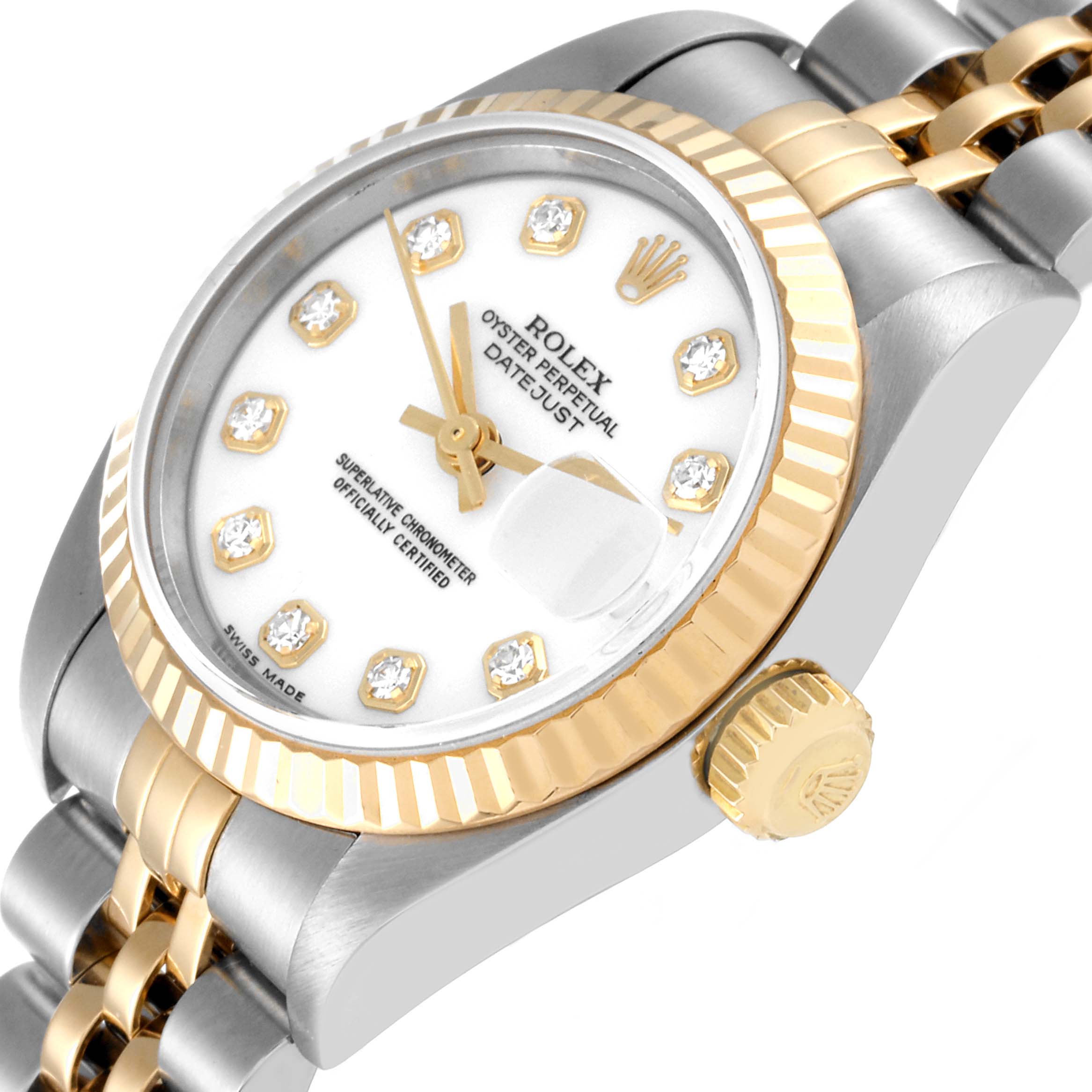 The image shows a close-up of the face, bezel, crown, and part of the bracelet of a Rolex Datejust 79173 Women's Steel and Gold (two tone) White Dial 79173 Women's Steel and Gold (two tone) White Dial watch at an angled view.