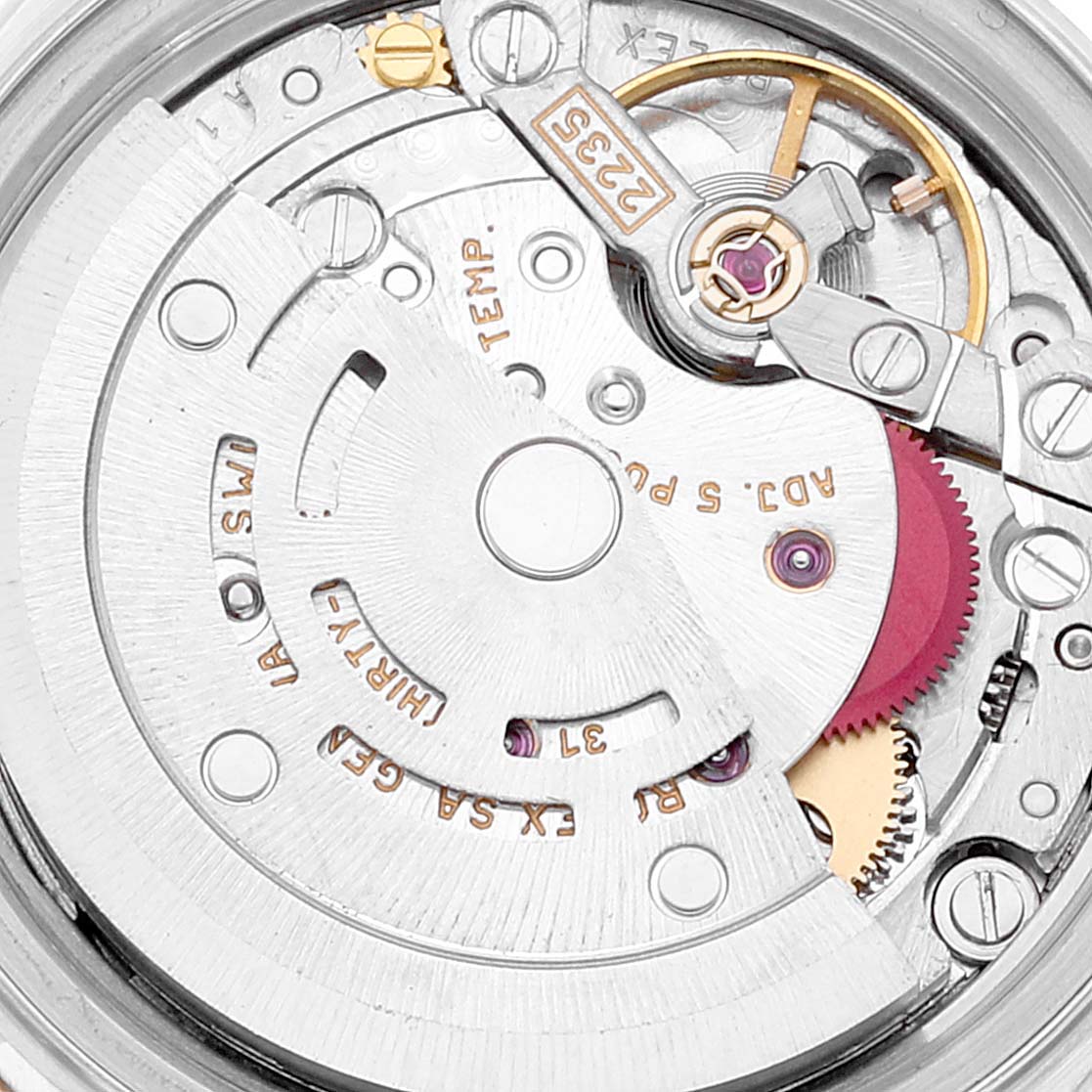 This image shows a close-up of the movement and internal mechanics of a Rolex Datejust 79173 Women's Steel and Gold (two tone) White Dial 79173 Women's Steel and Gold (two tone) White Dial watch.