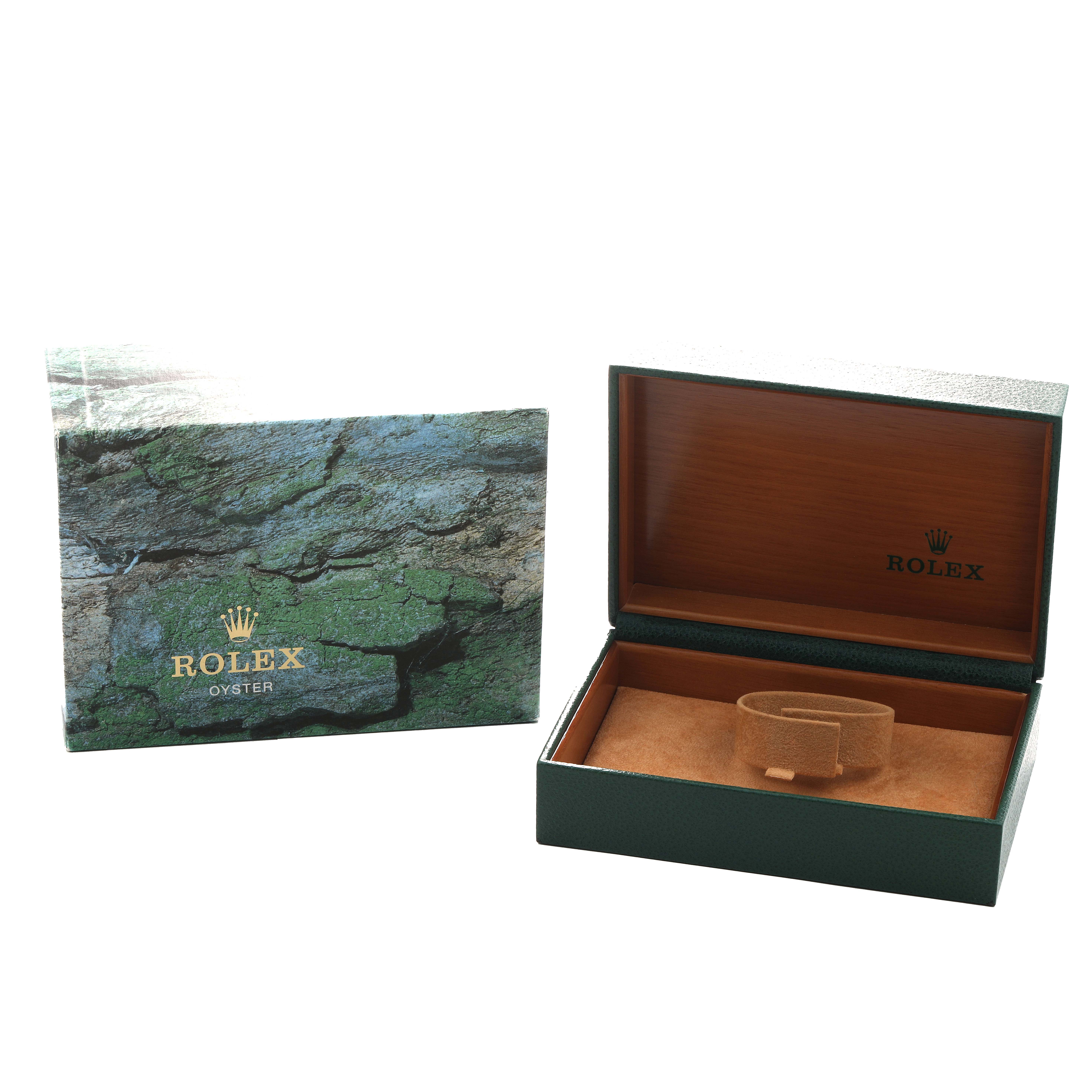 The image shows an open Rolex GMT-Master 16713 Men's Steel and Gold (two tone) Black Dial watch box and outer packaging, revealing its interior compartment.