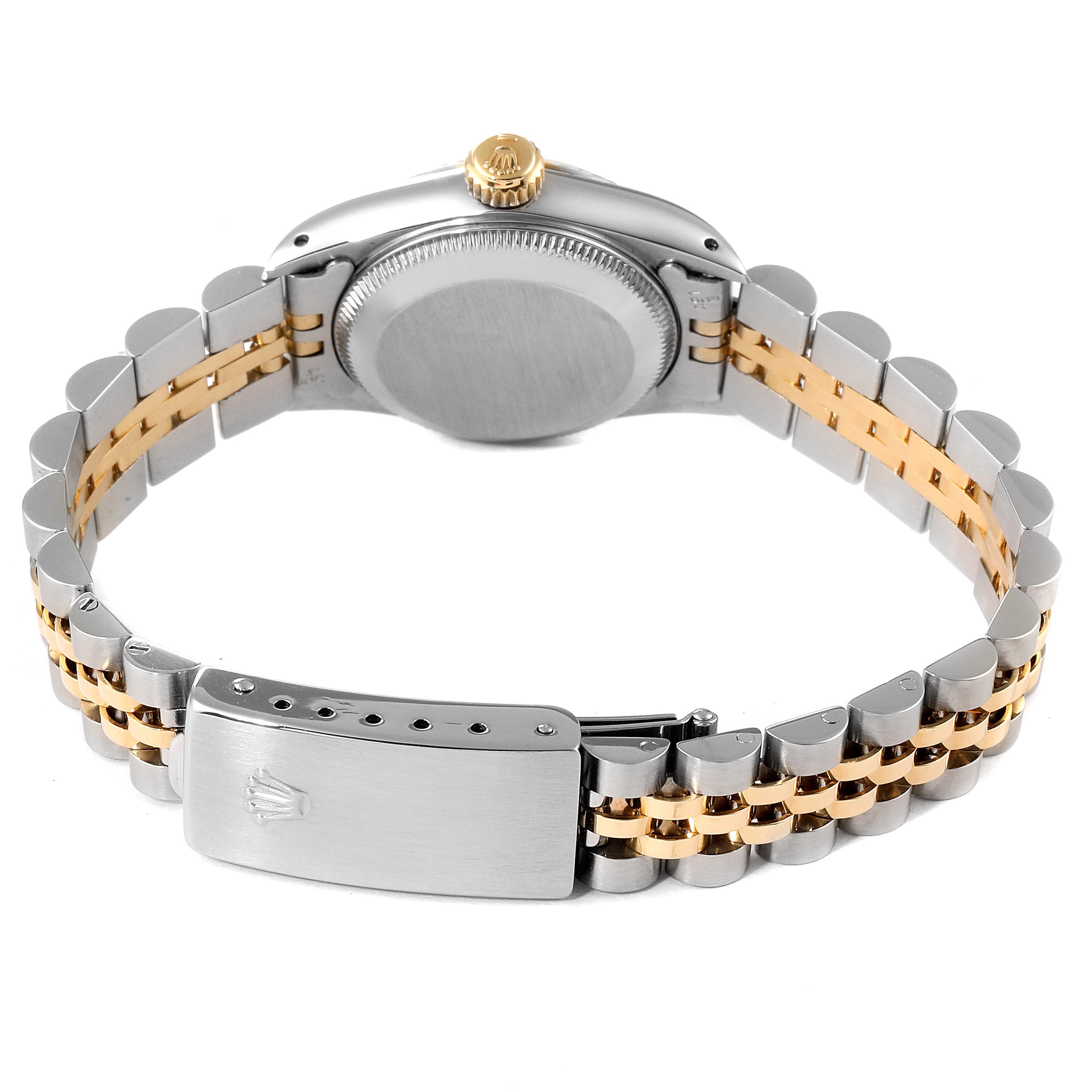 The image shows the back view of a Rolex Oyster Perpetual 67193 Women's Steel and Gold (two tone) White Dial 67193 Women's Steel and Gold (two tone) White Dial watch, highlighting its bracelet and the folded clasp.