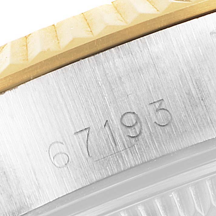 The image shows a close-up of the side casing of a Rolex Oyster Perpetual 67193 Women's Steel and Gold (two tone) White Dial 67193 Women's Steel and Gold (two tone) White Dial model, featuring its engraved model number 67193.