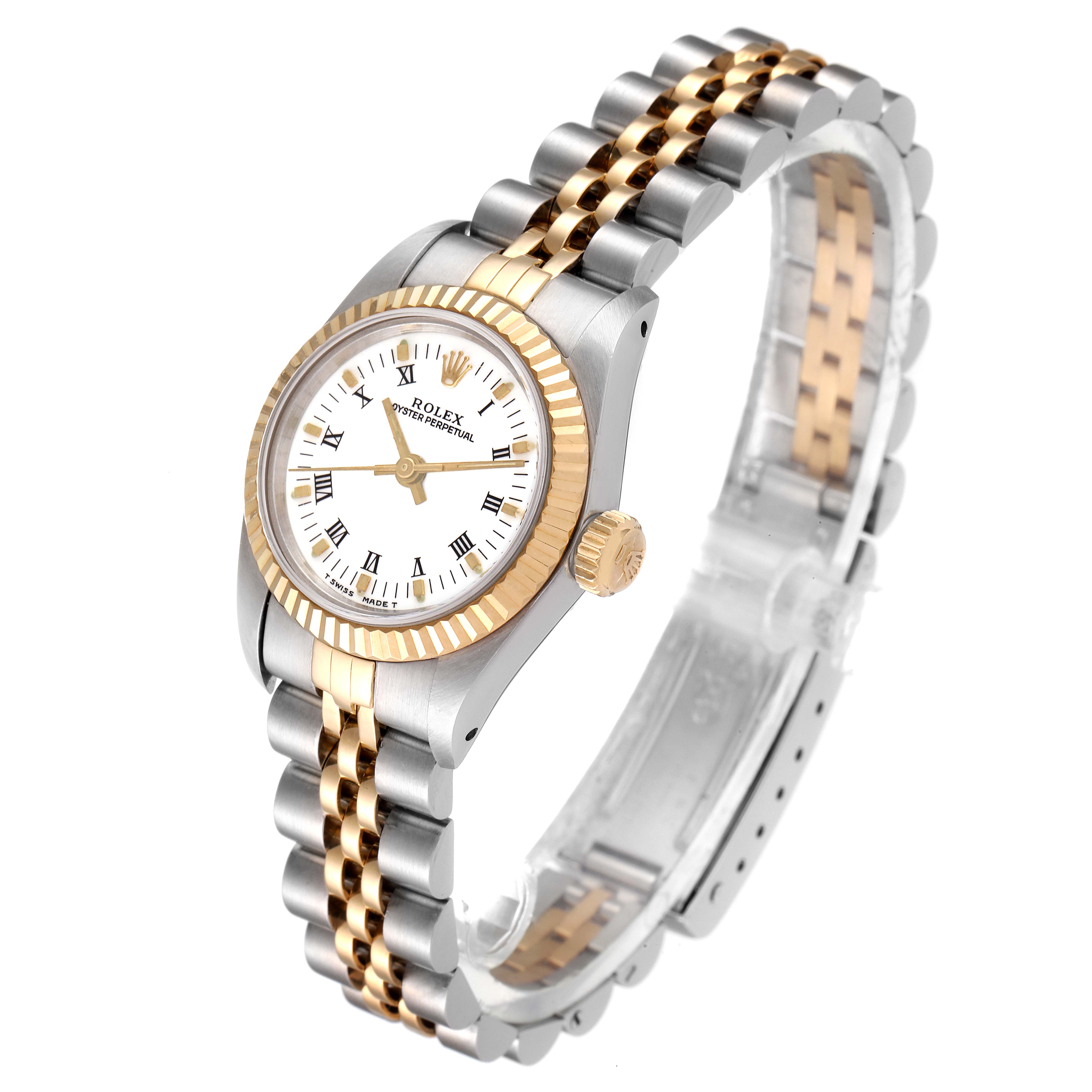 The Rolex Oyster Perpetual 67193 Women's Steel and Gold (two tone) White Dial 67193 Women's Steel and Gold (two tone) White Dial watch is shown at a three-quarter angle, highlighting its dial, bezel, crown, and two-tone bracelet.