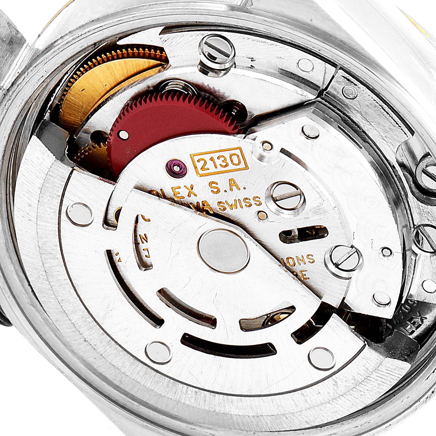 This image shows a close-up view of the movement inside a Rolex Oyster Perpetual 67193 Women's Steel and Gold (two tone) White Dial 67193 Women's Steel and Gold (two tone) White Dial watch, highlighting its intricate components and gears.