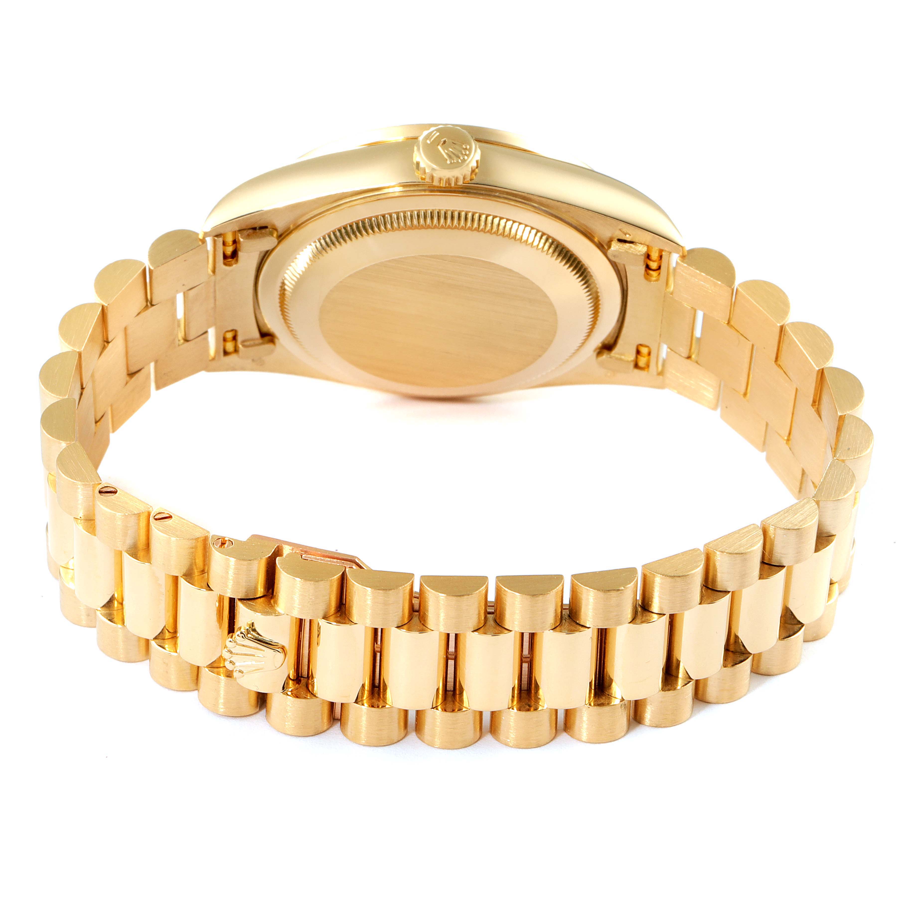This image shows the back side and bracelet of a gold Rolex President 18388 Men's Yellow Gold Champagne Dial 18388 Men's Yellow Gold Champagne Dial model watch from a rear angle.