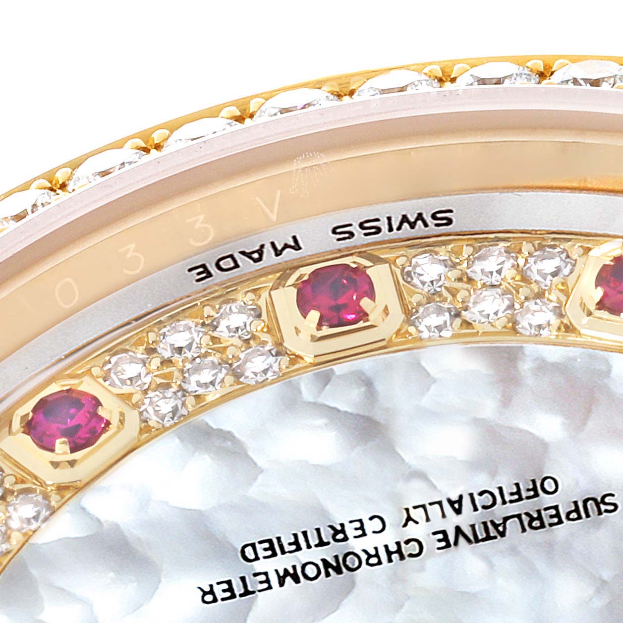 The image shows a close-up of the bezel and the edge of the dial of a Rolex President 118388 Men's Yellow Gold Mother of Pearl Dial 118388 Men's Yellow Gold Mother of Pearl Dial model watch.