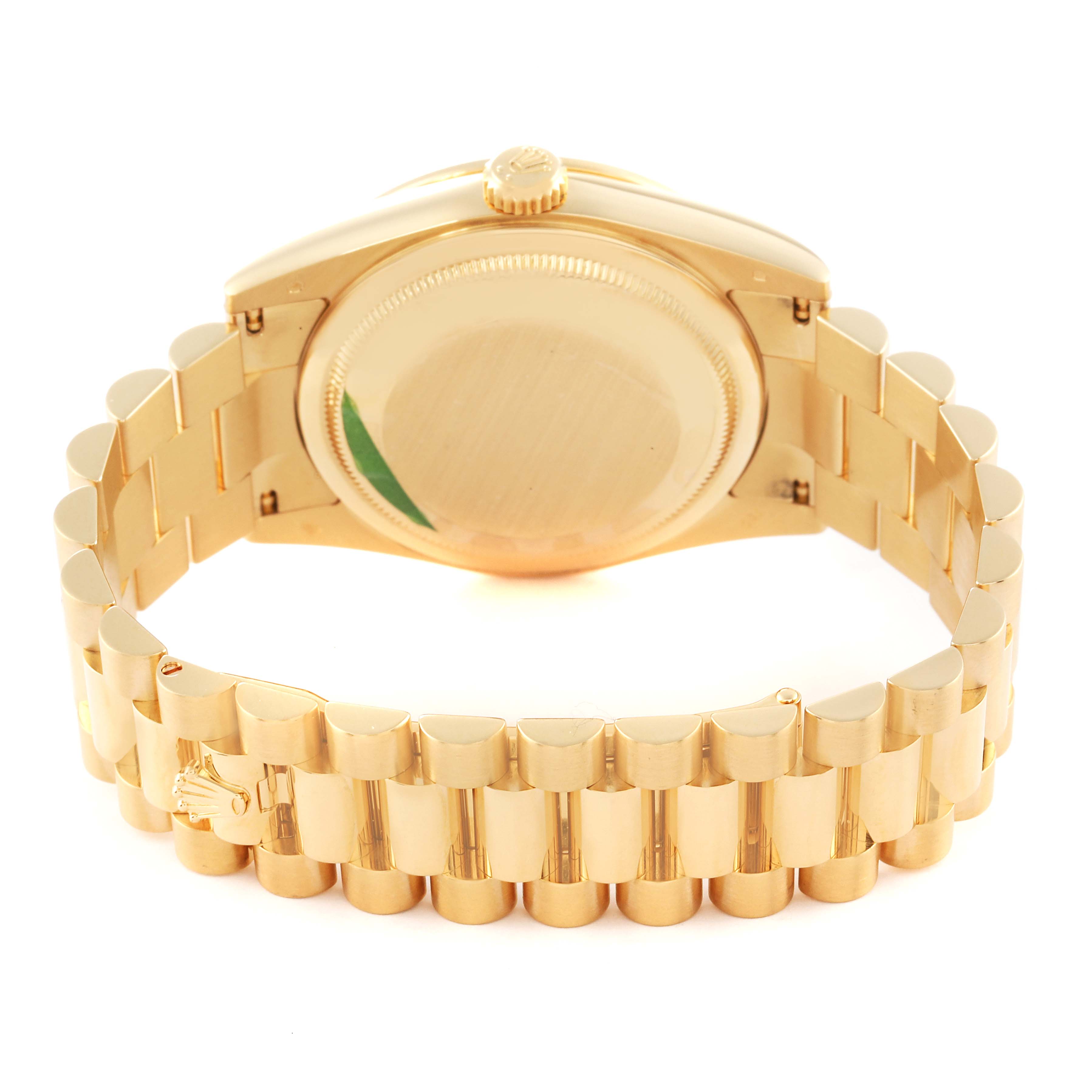 This image shows the back case and part of the bracelet of a Rolex President 118388 Men's Yellow Gold Mother of Pearl Dial 118388 Men's Yellow Gold Mother of Pearl Dial model watch.