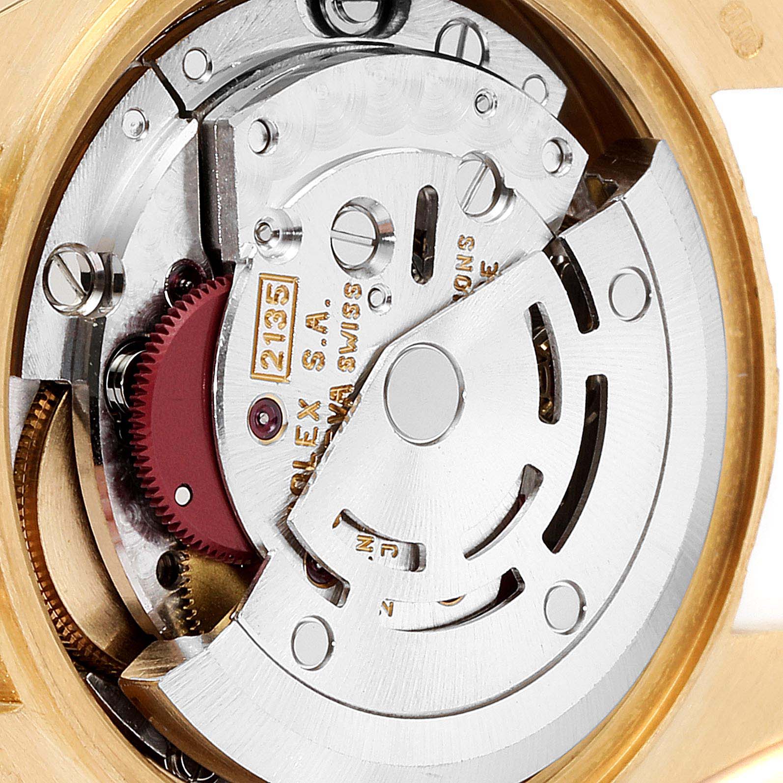 The image shows the internal mechanical movement of a Rolex Datejust 69158 Women's Yellow Gold Champagne Dial 69158 Women's Yellow Gold Champagne Dial watch from a close-up angle.