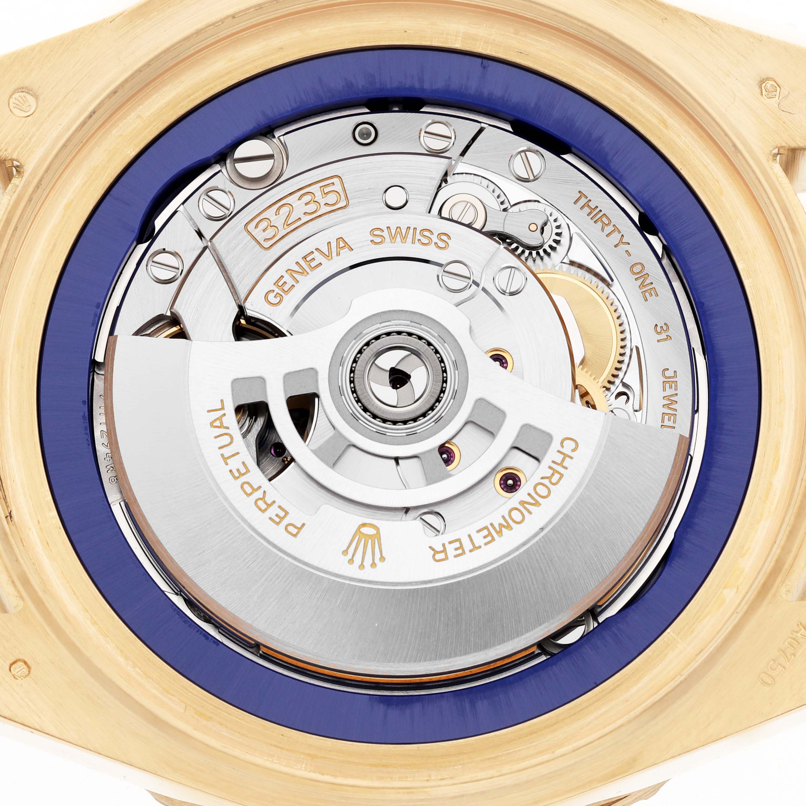 The image shows the movement and rotor of a Rolex Sea-Dweller 136668 Men's Yellow Gold Blue Dial, viewed from the back with intricate mechanical details.