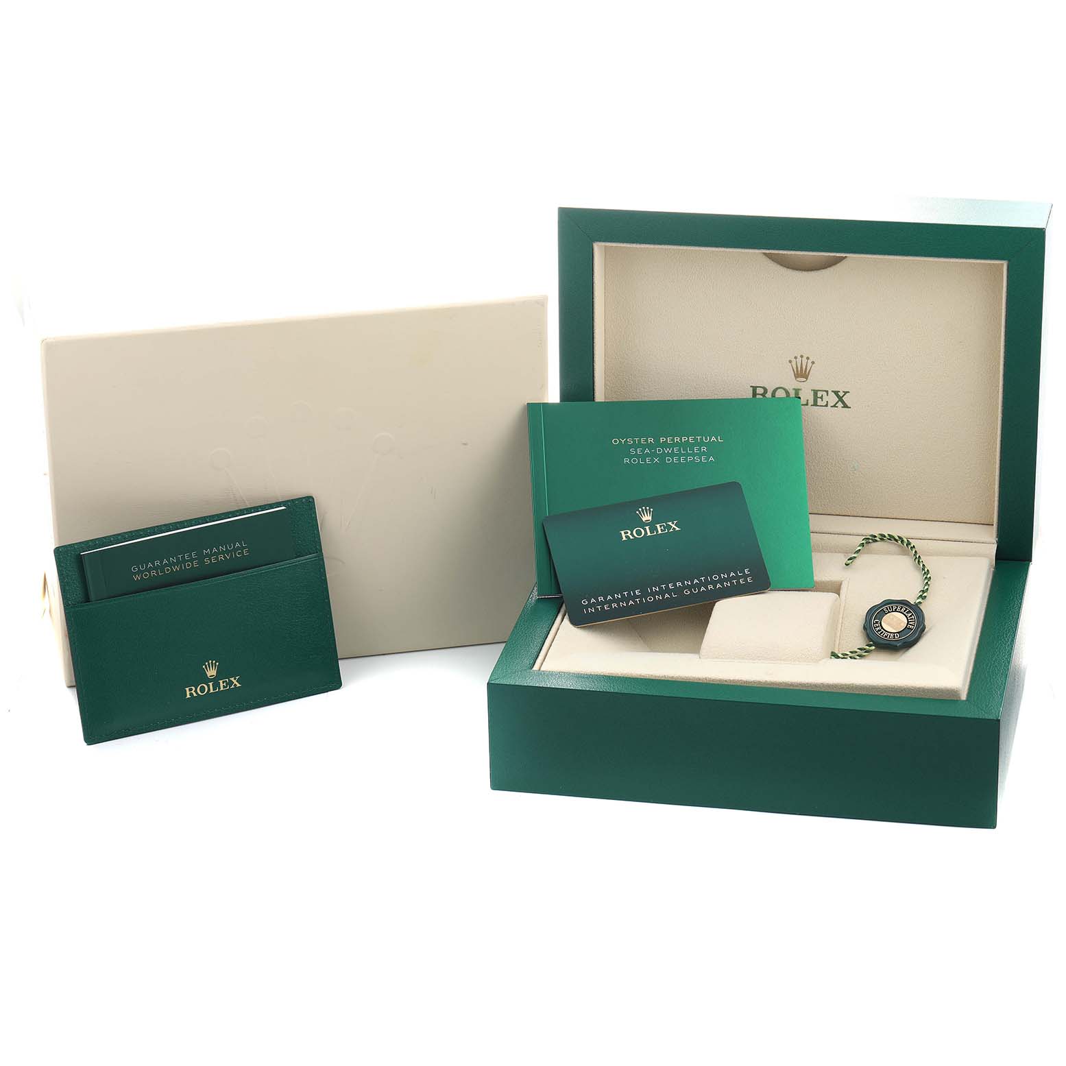 The image shows a Rolex Sea-Dweller 136668 Men's Yellow Gold Blue Dial watch box, warranty card, manuals, and a green tag at a three-quarter angle.