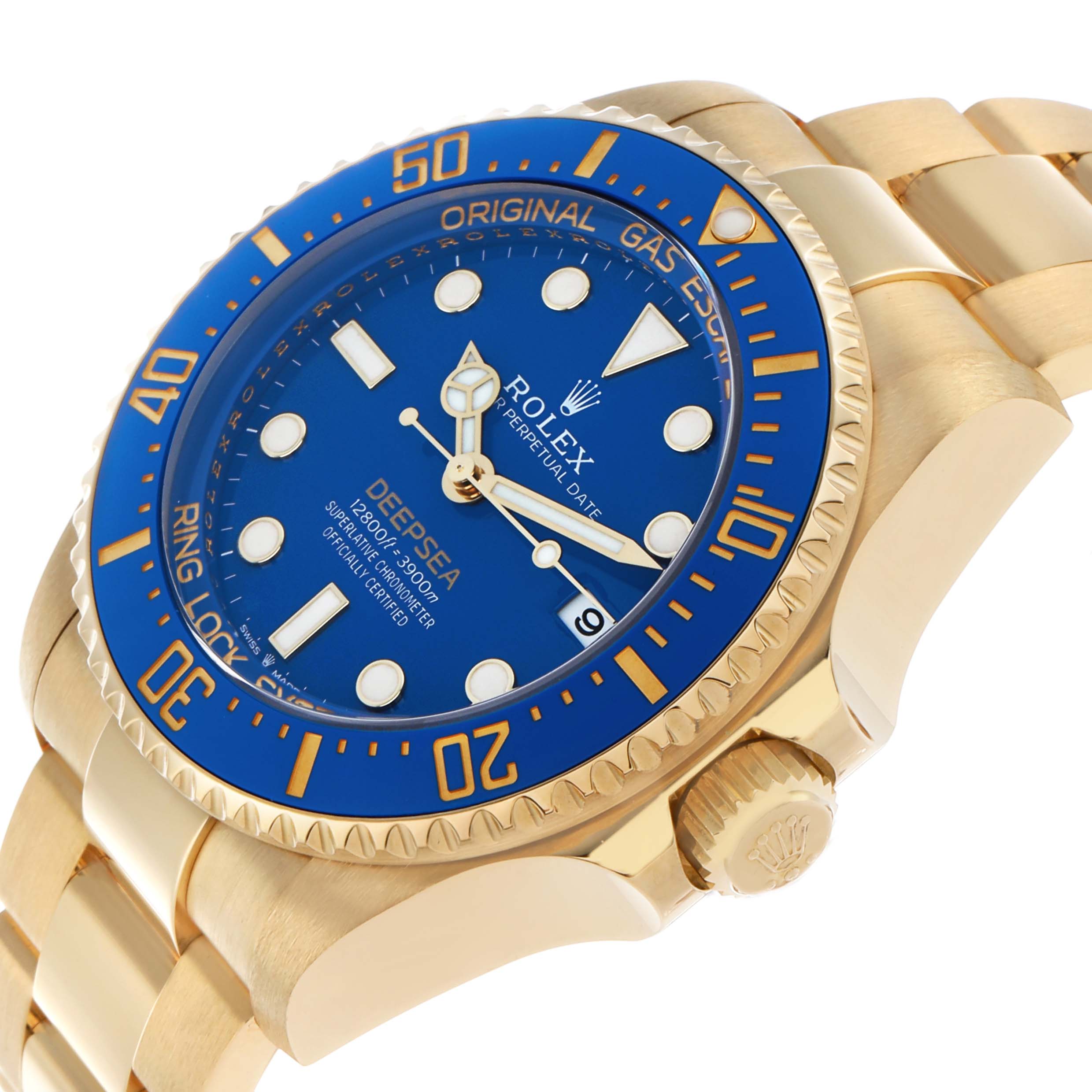 The Rolex Sea-Dweller 136668 Men's Yellow Gold Blue Dial watch is shown at an angled side view, highlighting the blue dial, bezel, and part of the bracelet.